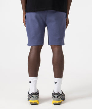 Waffle Shorts in Navy by BOSS. EQVVS Model Shot.
