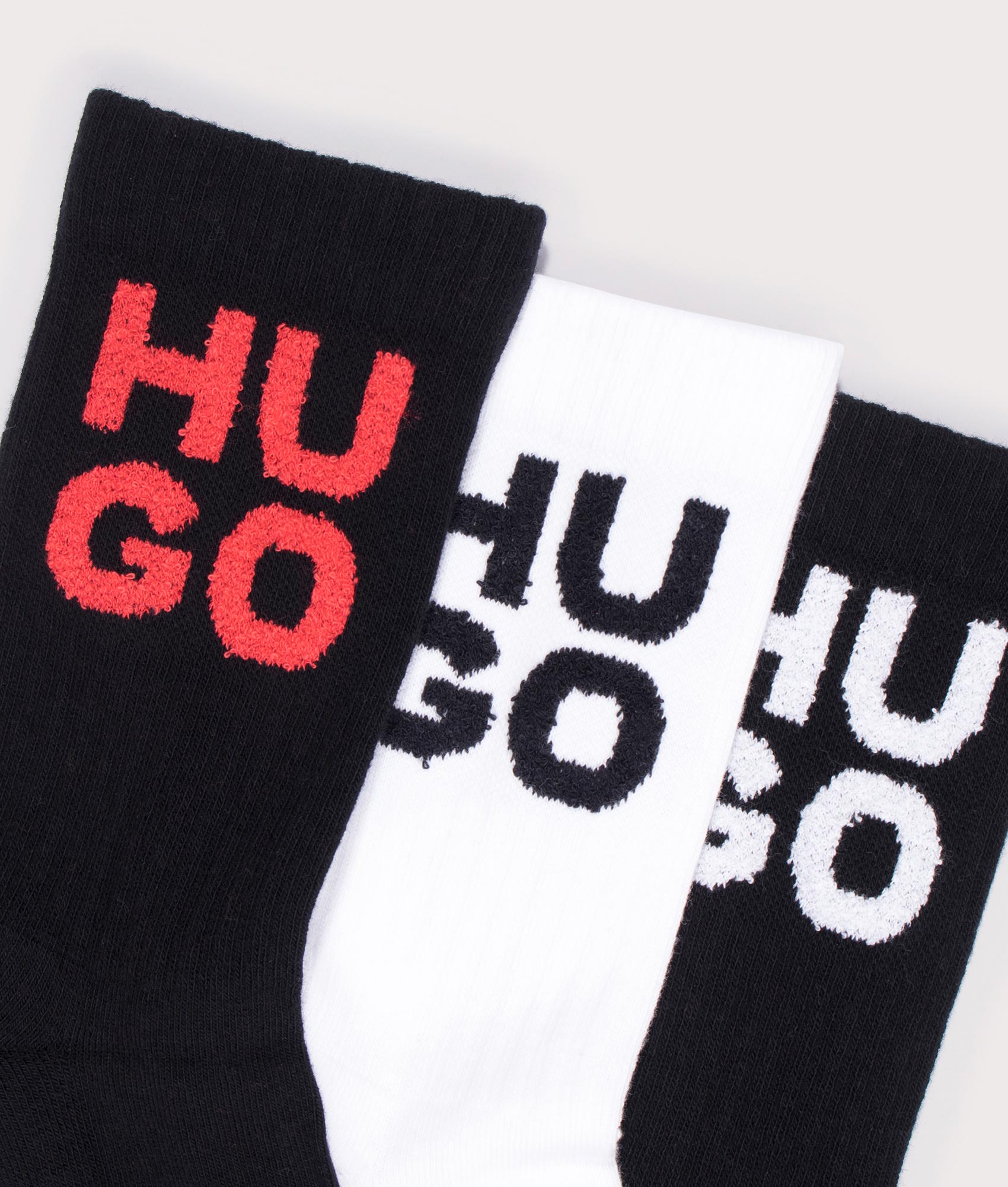 3P Rib Stencil CC Socks in Black by HUGO. EQVVS Flat shot.