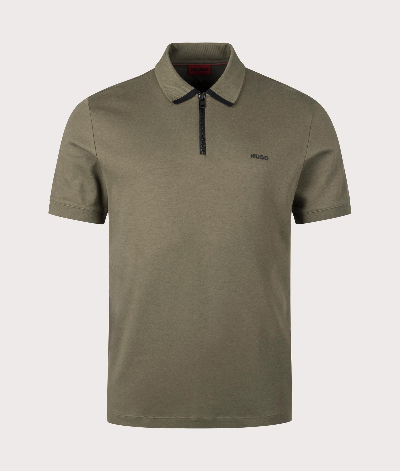 Dalomino Polo Shirt in Dark Beige by HUGO. Shot at EQVVS. Front shot. 