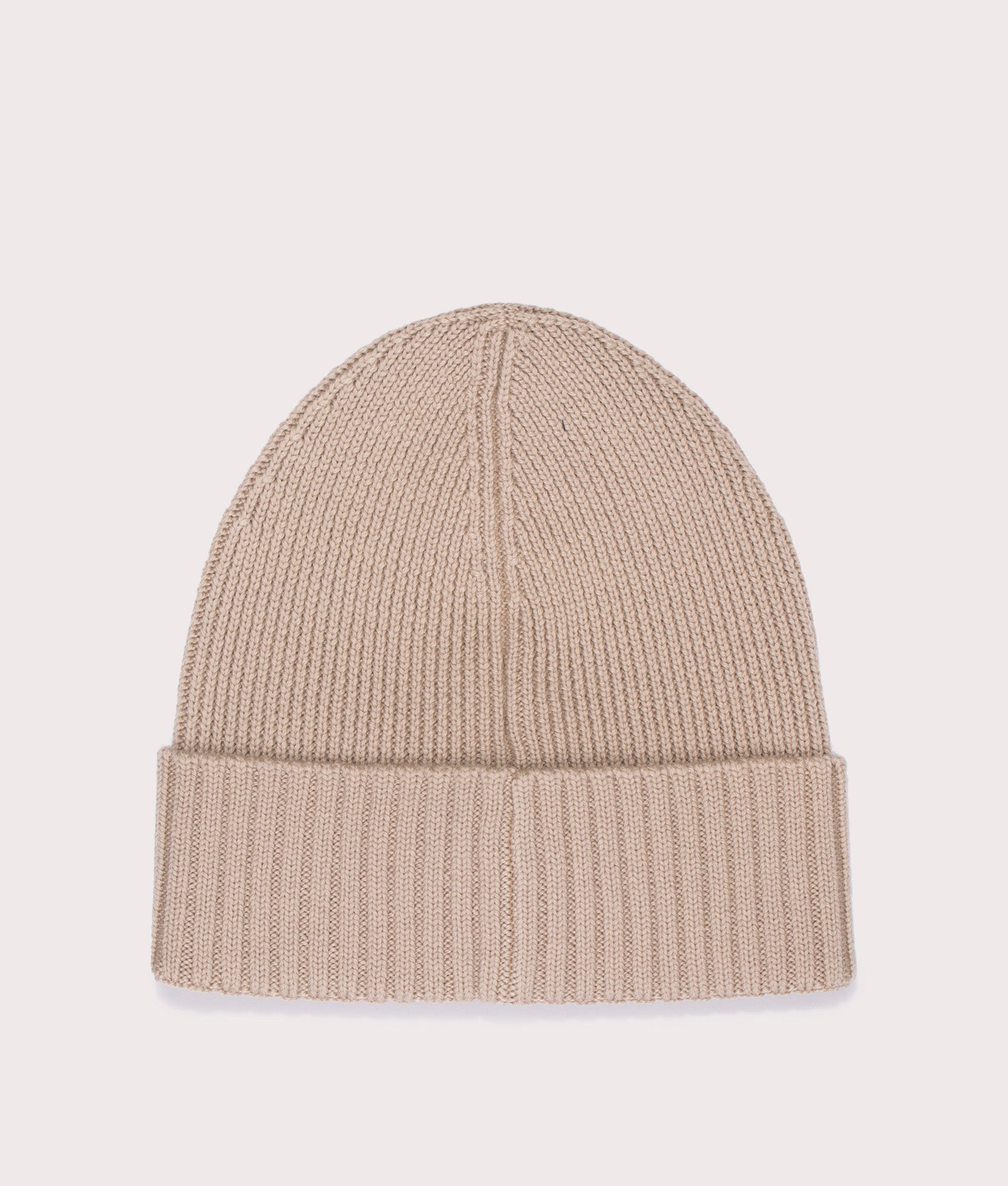 BOSS Flavio Beanie in Light Beige. 100% responsible source Virgin wool. At  EQVVS Menswear. back logo shot.