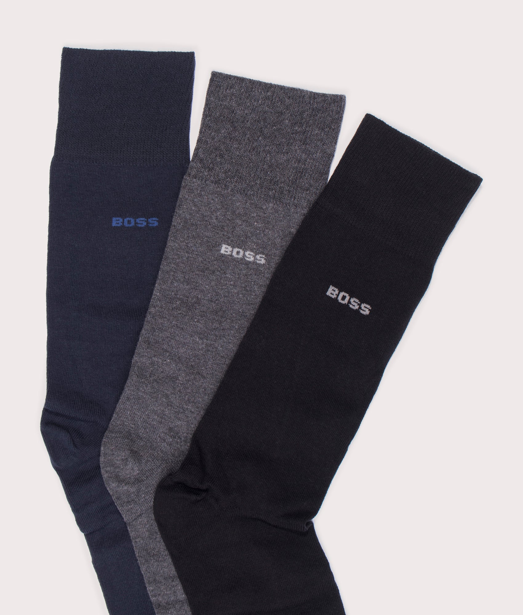 BOSS 3 Pack RS Socks GiftSet Uni CC in Grey, Black and Navy. EQVVS Laid Bag Shot.
