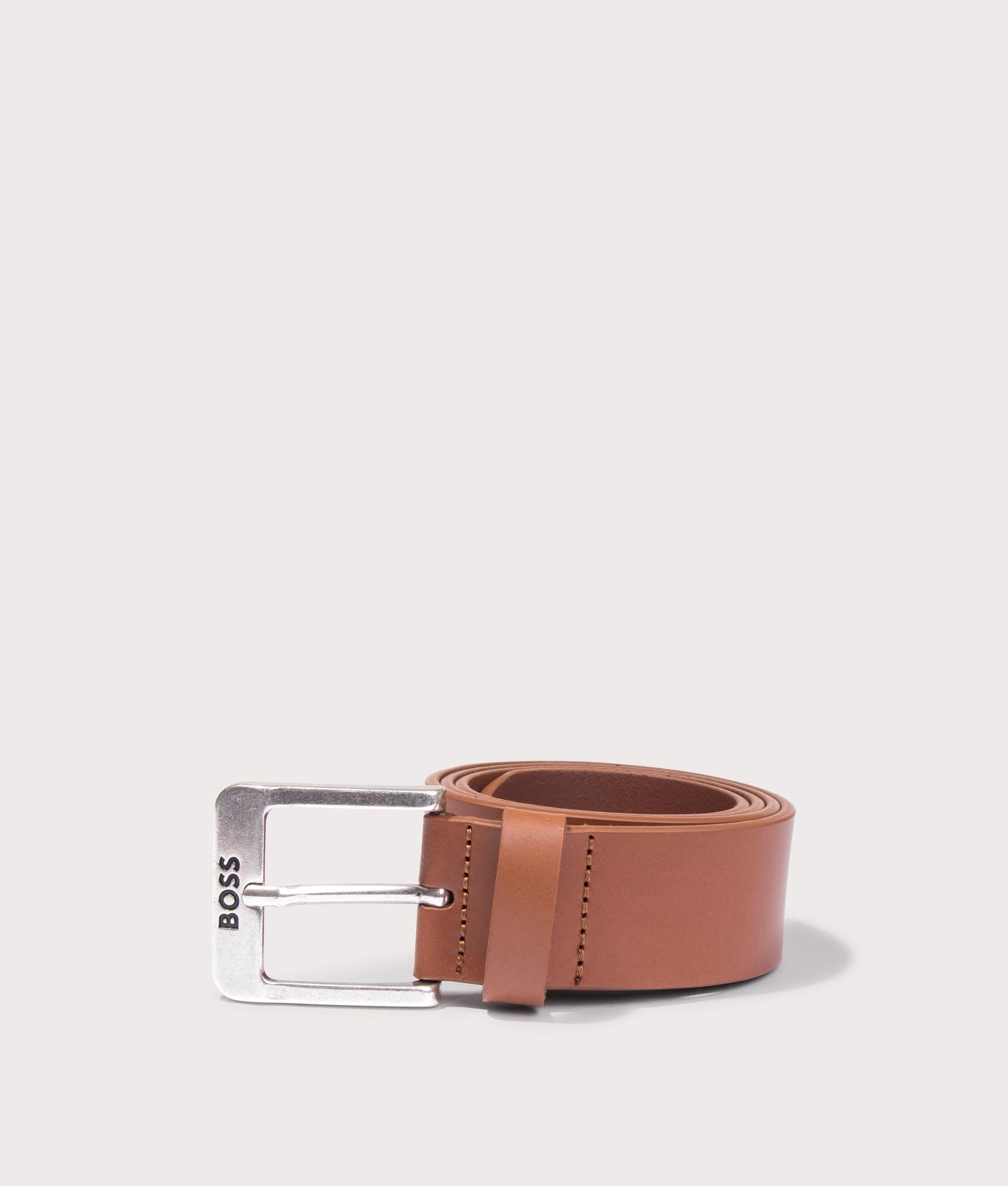 BOSS Jemio Belt in Medium Brown at EQVVS. Rolled Shot.