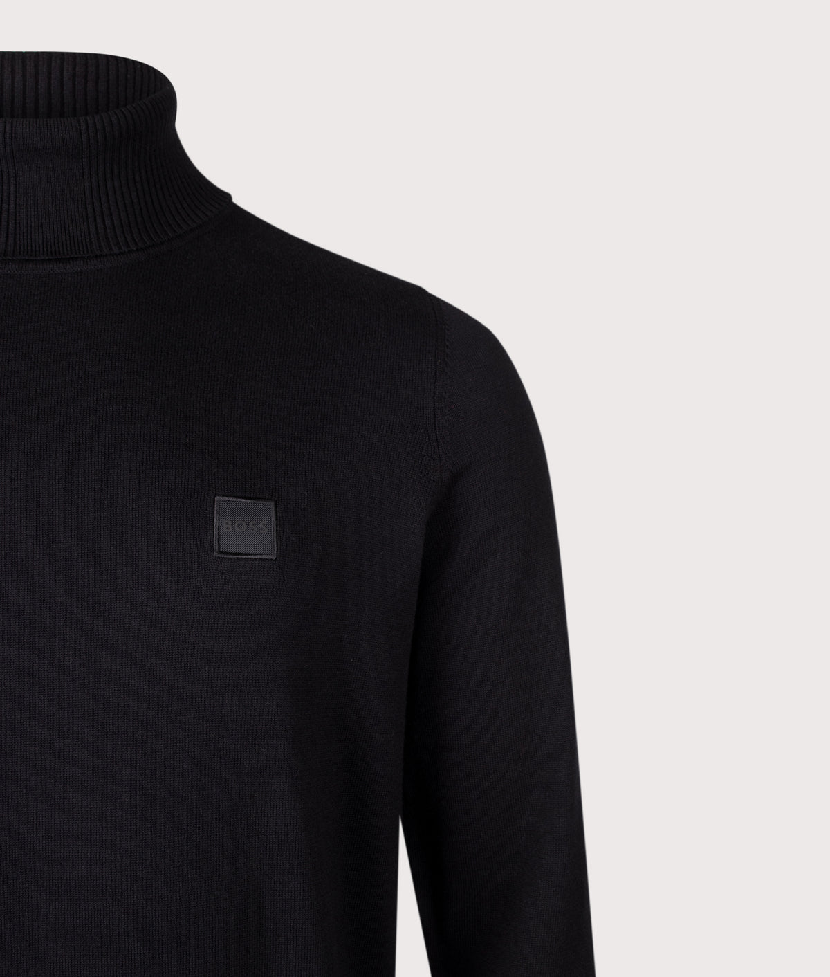 BOSS Regular Fit Akiro Rollneck Jumper in Black at EQVVS Menswear. Detail shot.