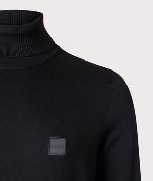 BOSS Akiro Rollneck Jumper in Black, Cotton/Cashmere Blend. At EQVVS Menswear. Front logo shot