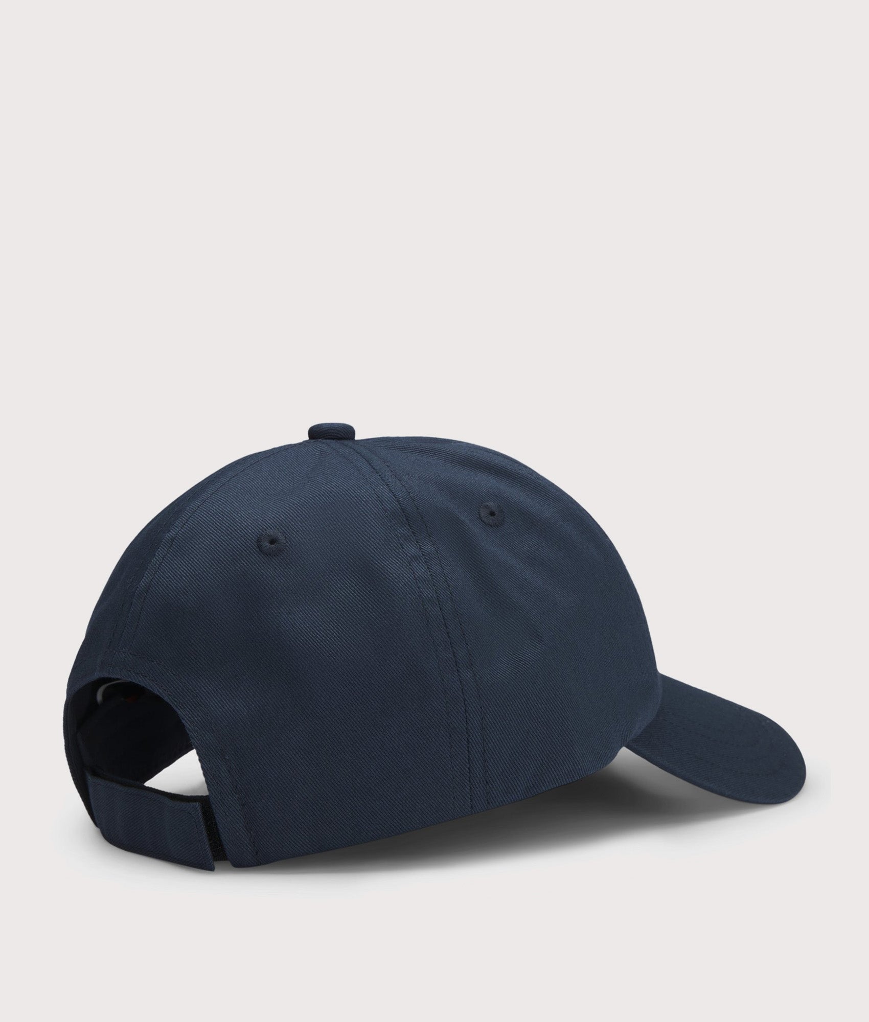 BOSS Derrel PL Cap in Dark Blue at EQVVS Menswear. Angled back shot.