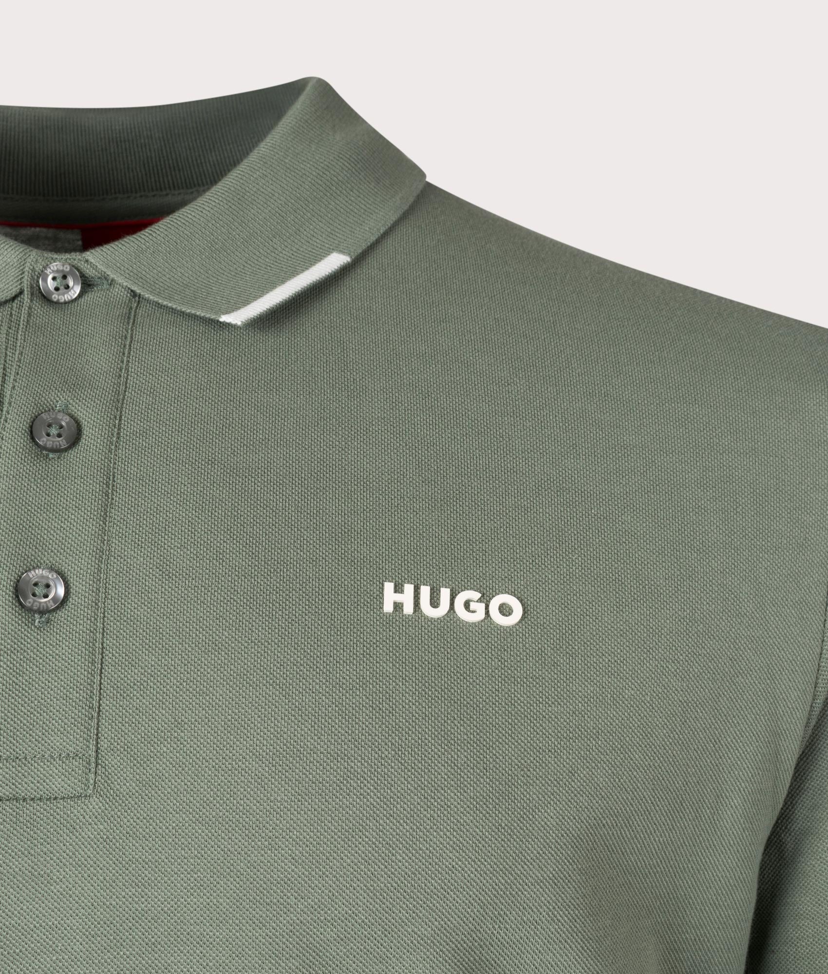 Derrikos Polo Shirt in Open Green. Detail angle shot at EQVVS.
