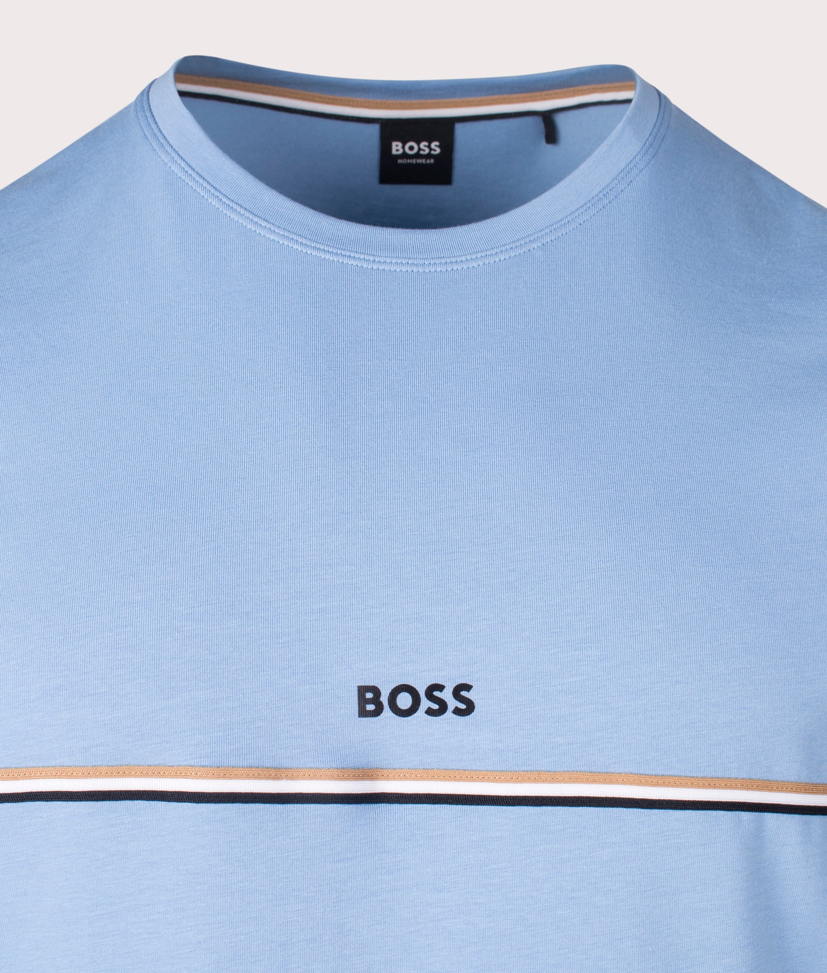 BOSS Unique T-Shirt in Light/Pastel Blue. Shot at EQVVS.  Front logo shot 