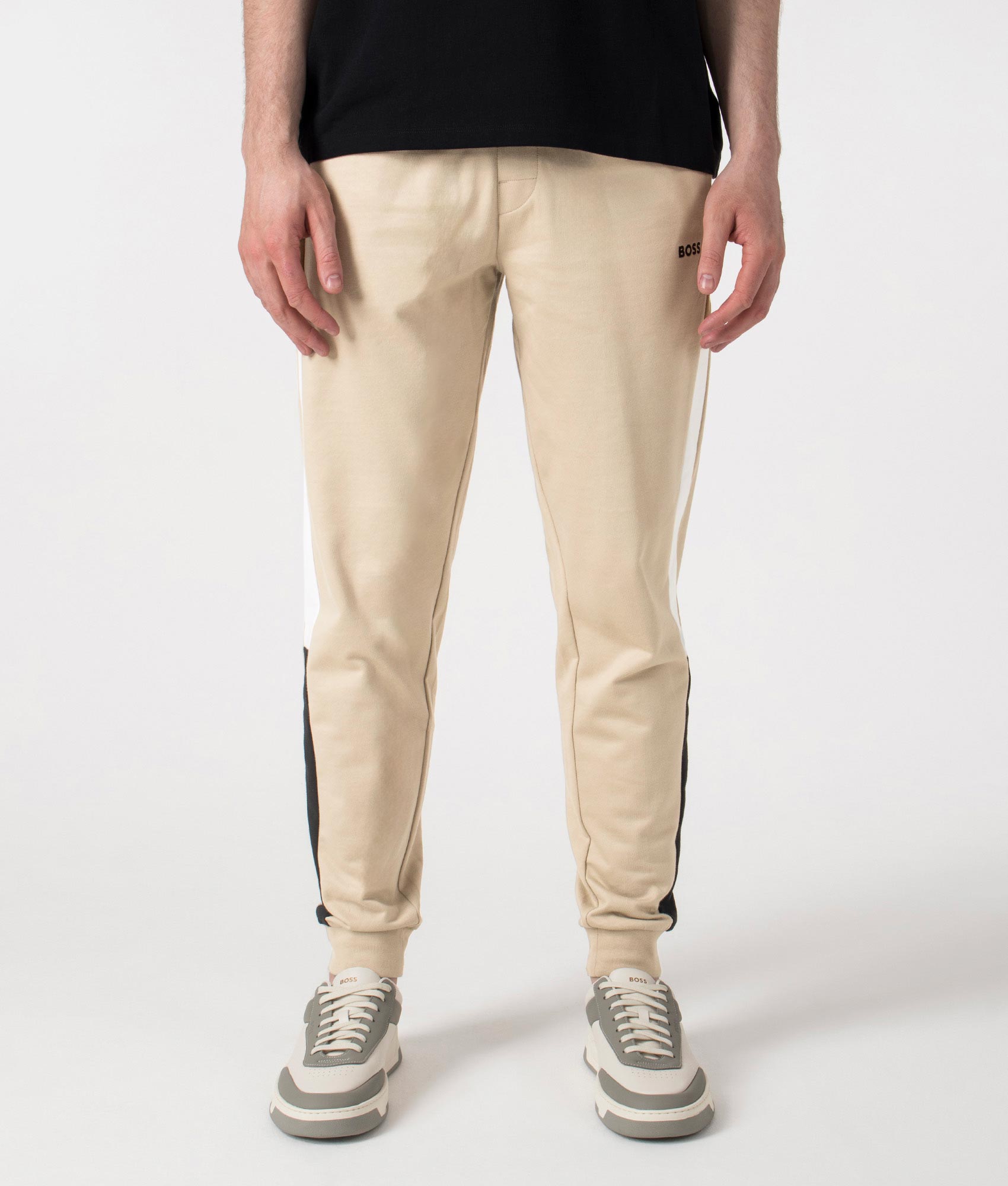 BOSS Iconic Joggers in Light Beige at EQVVS. Front Shot.