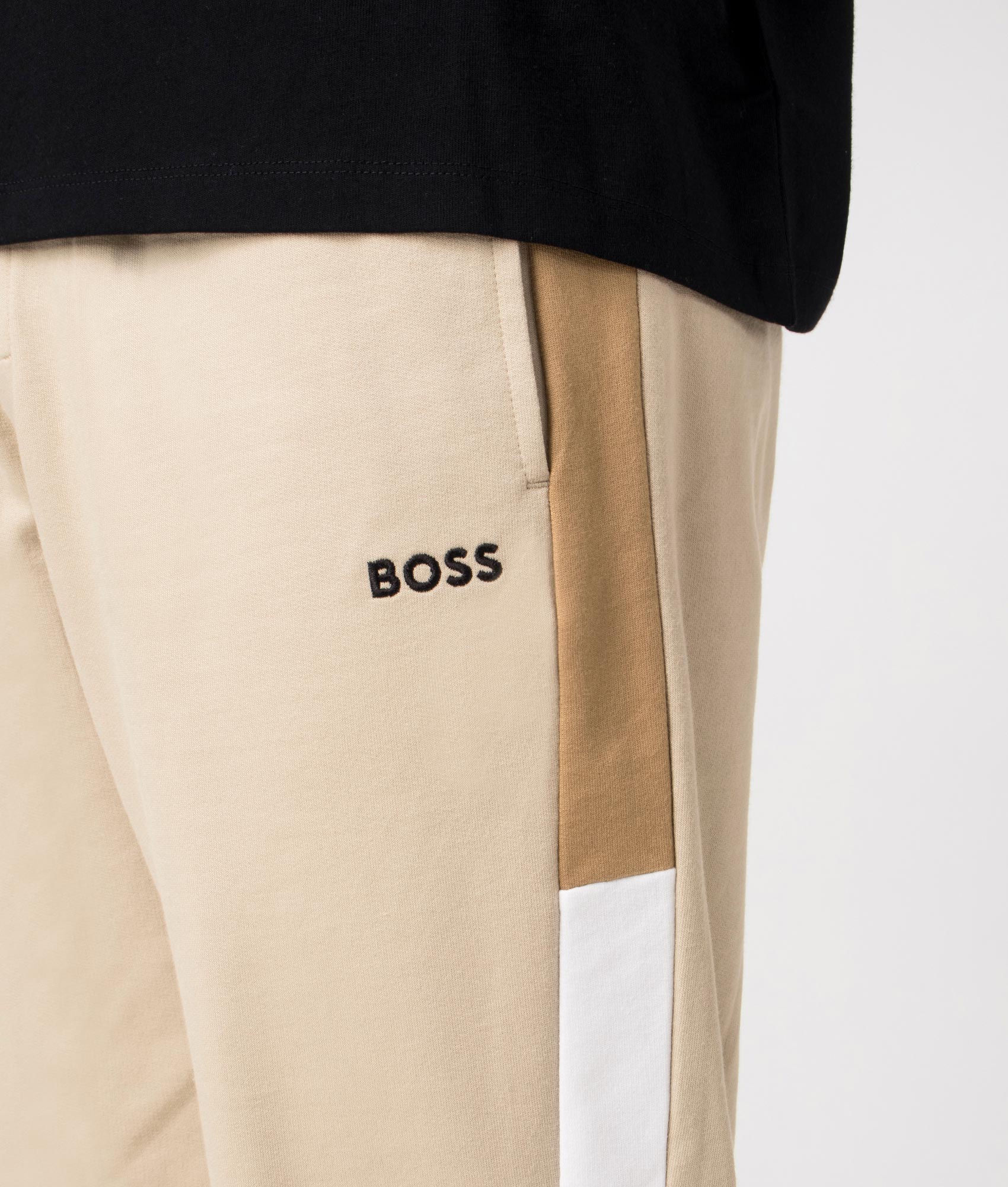 BOSS Iconic Joggers in Light Beige at EQVVS. Detail Shot.