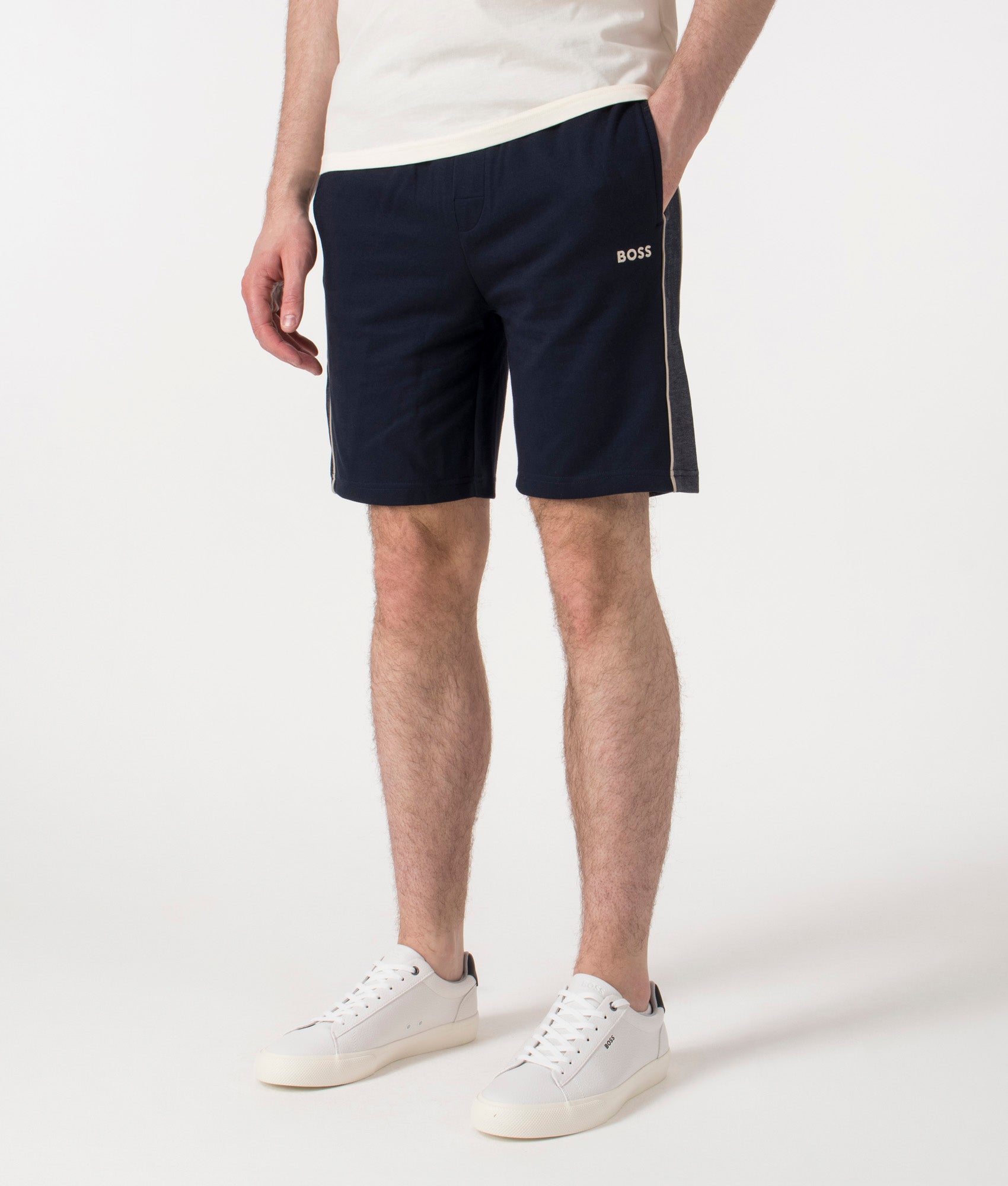 BOSS Tracksuit Shorts in Dark Blue at EQVVS. Angle Shot.