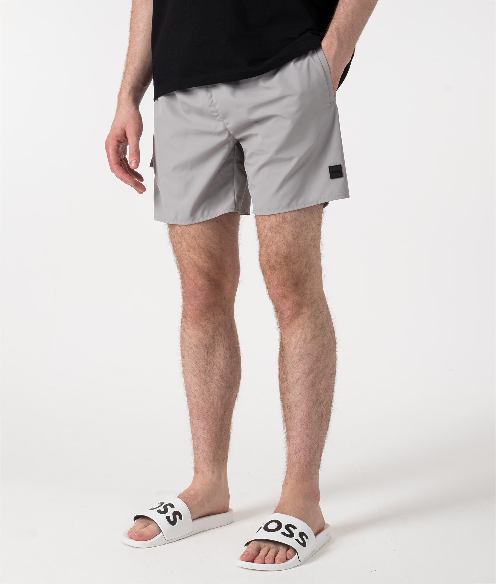BOSS Dive Swim Shorts in Medium Grey at EQVVS. Angle Shot.