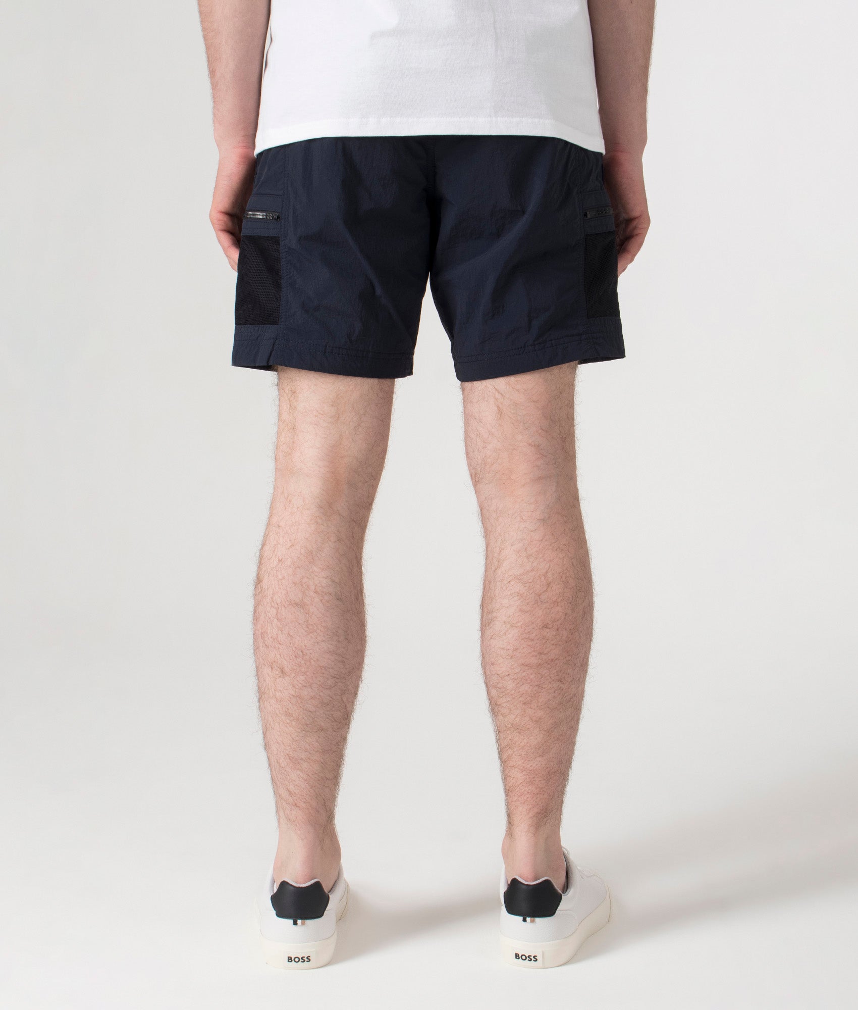 BOSS Sal Cargo Shorts in Dark Blue at EQVVS. Back shot.