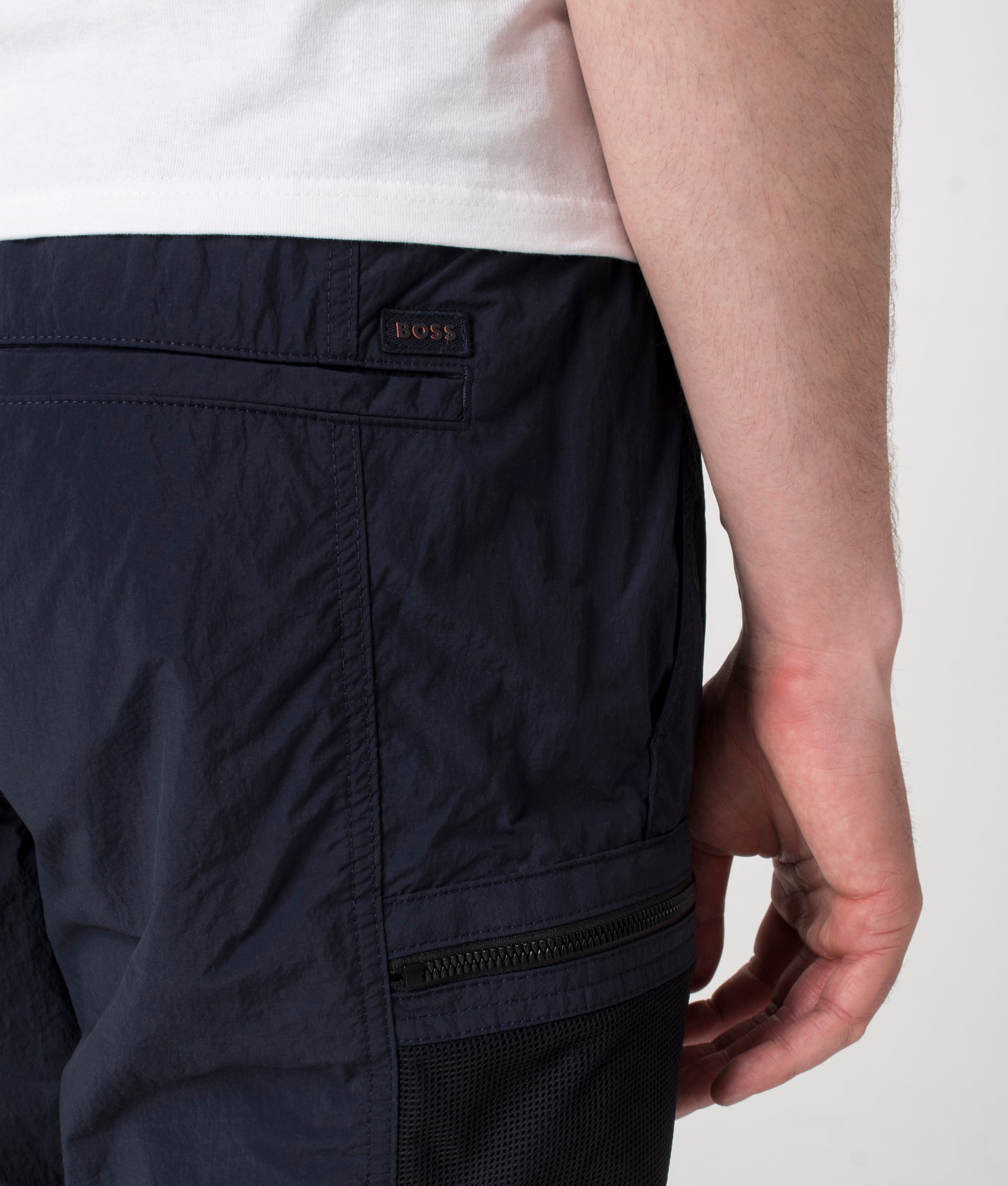 BOSS Sal Cargo Shorts in Dark Blue at EQVVS. Detail shot.