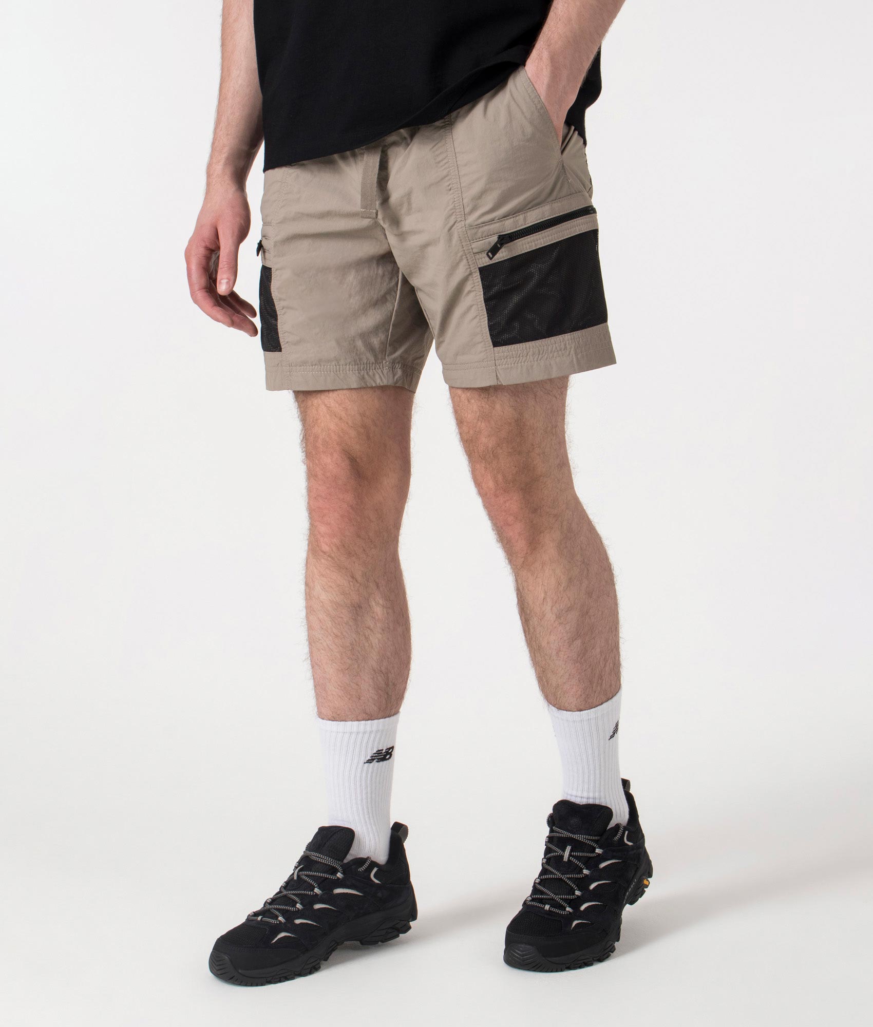 BOSS Sal Cargo Shorts in Open Beige at EQVVS. Angle shot.