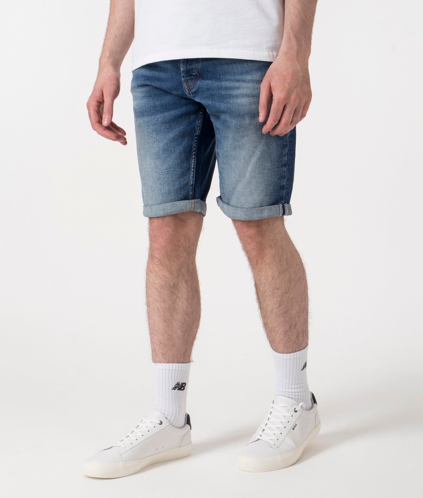HUGO 634 Shorts in Medium Blue. Shot at EQVVS. Side shot