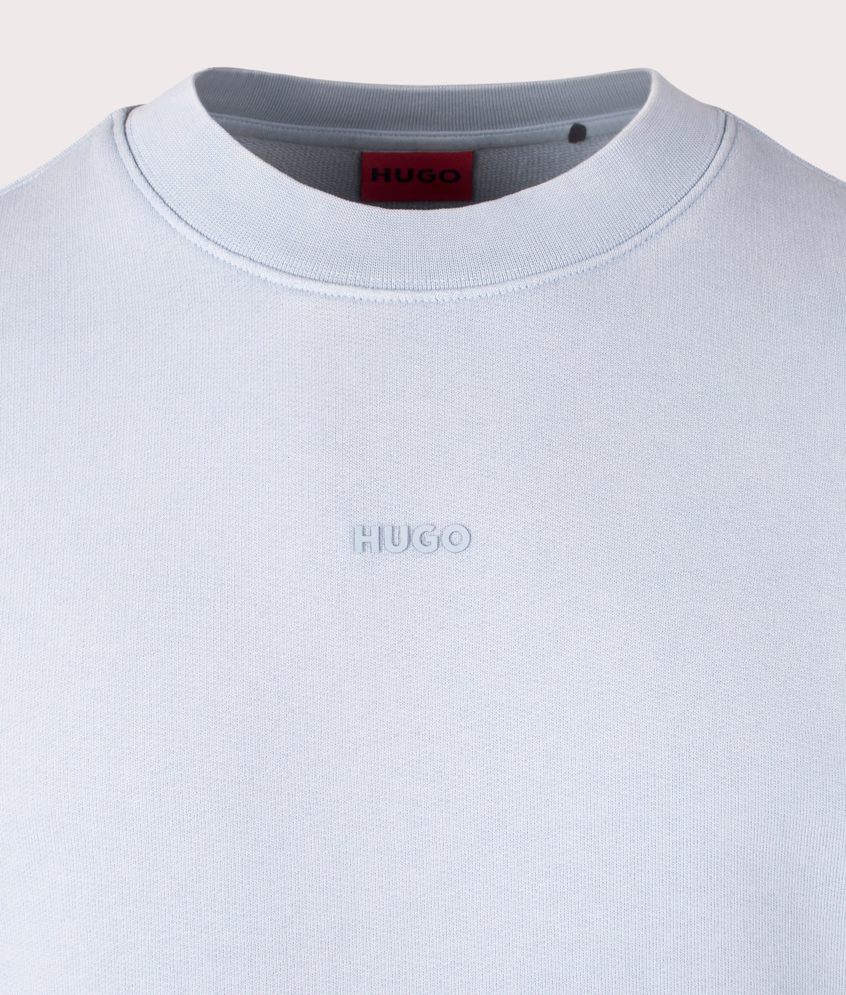 HUGO Relaxed Fit Dopaly Sweatshirt in Open Blue, 100% Cotton at EQVVS. Close-up shot. 