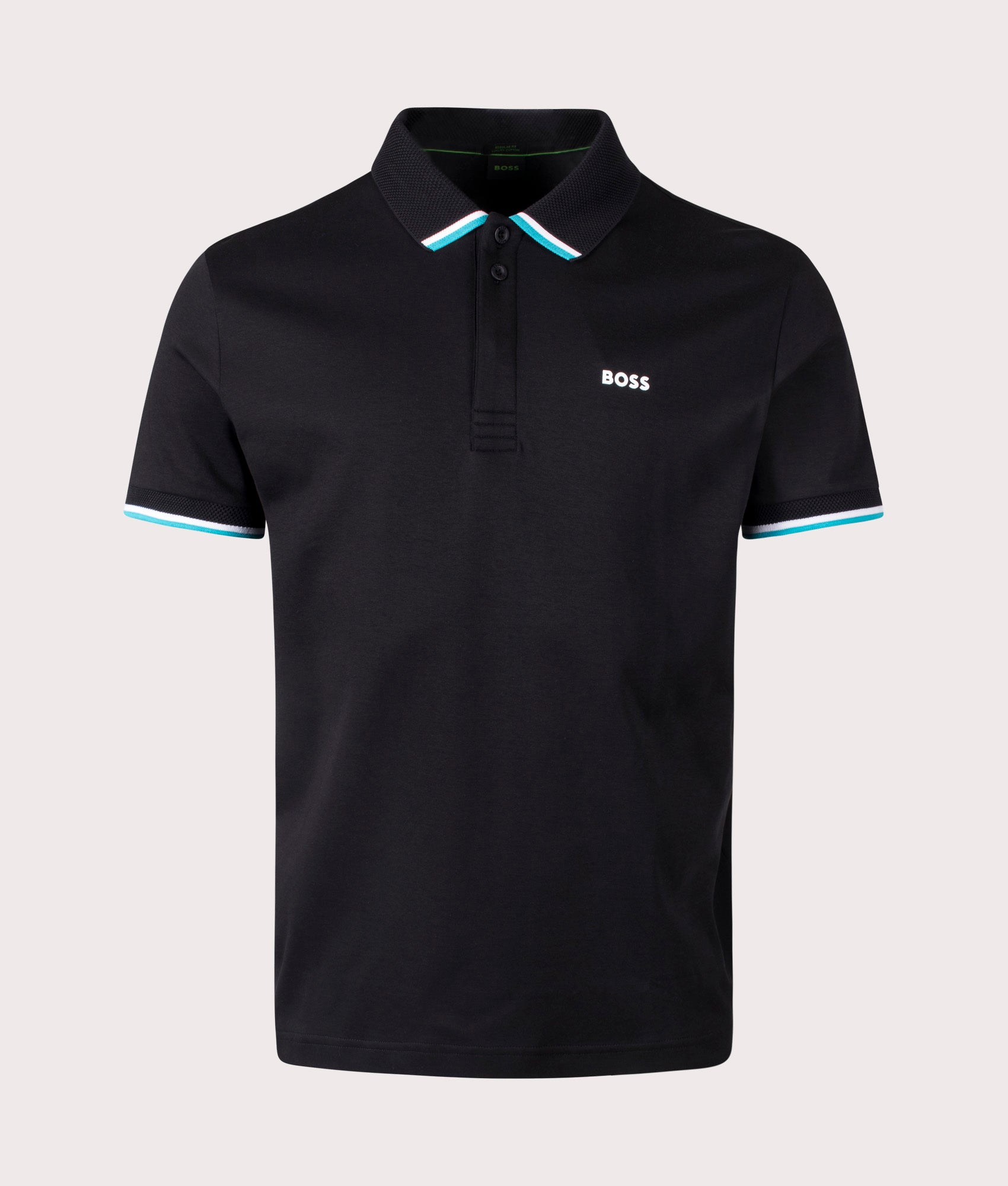 BOSS Paddy Lux Heritage Polo Shirt in Black. Shot at EQVVS. Front detail shot 
