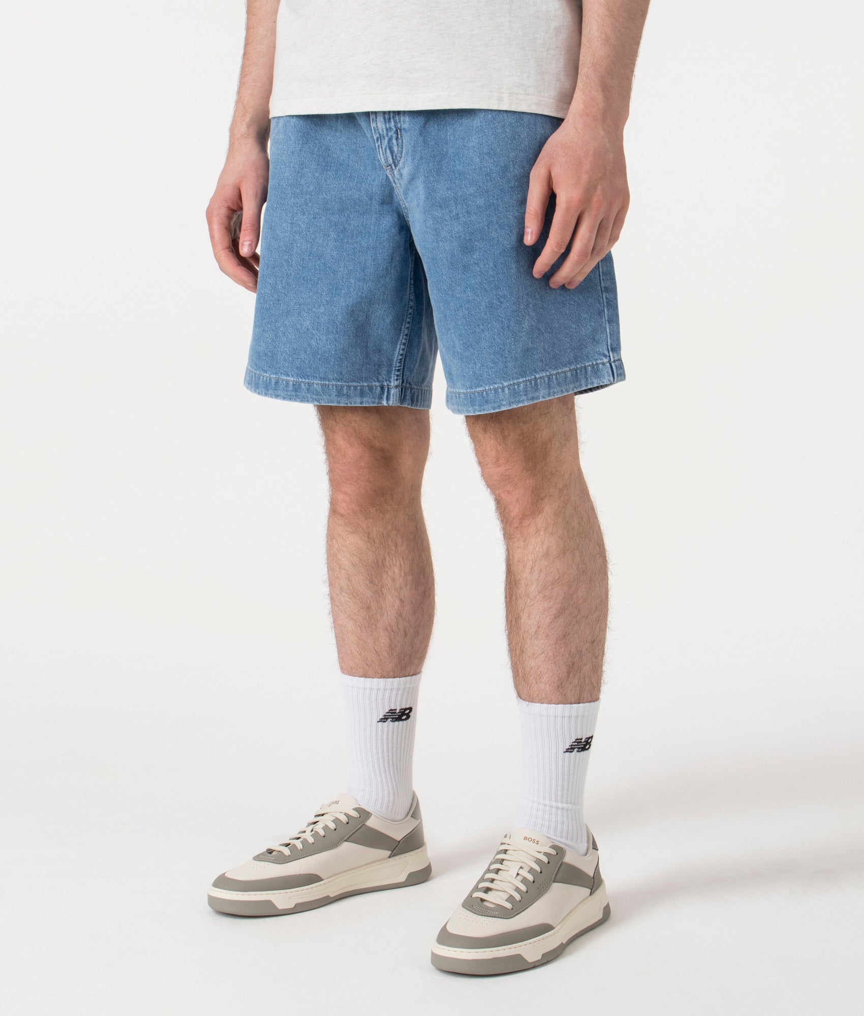BOSS Relaxed Fit Sandrew Shorts in Bright Blue Denim at EQVVS. Angle Shot.
