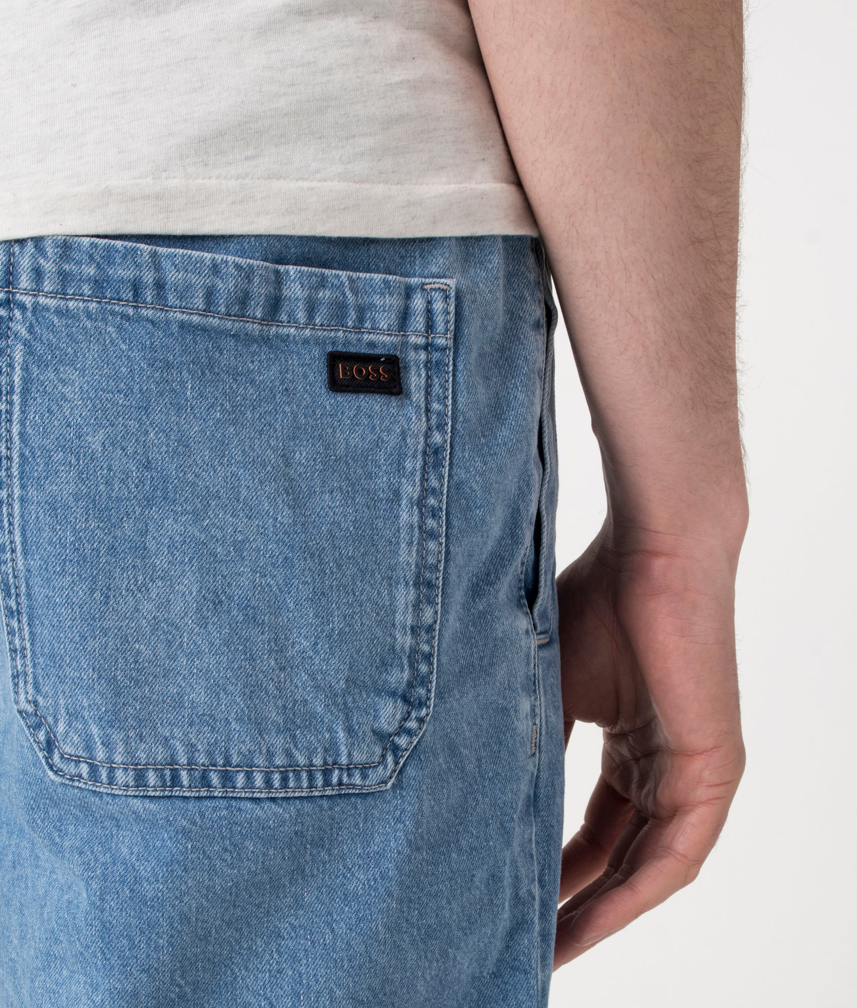 BOSS Relaxed Fit Sandrew Shorts in Bright Blue Denim at EQVVS. Detail Shot.