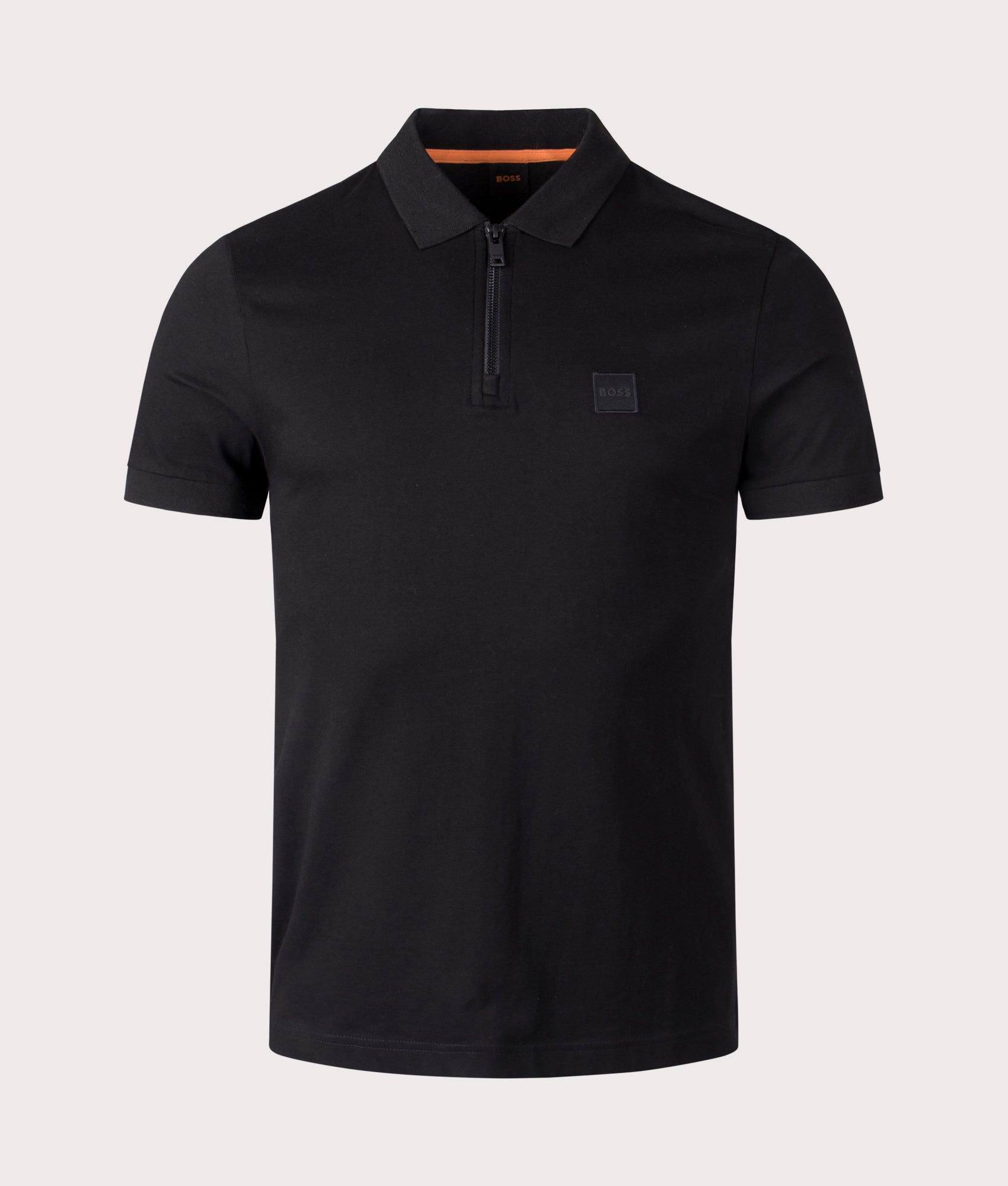 BOSS Slim Fit Passerzip Polo Shirt in Black at EQVVS. Front Shot.