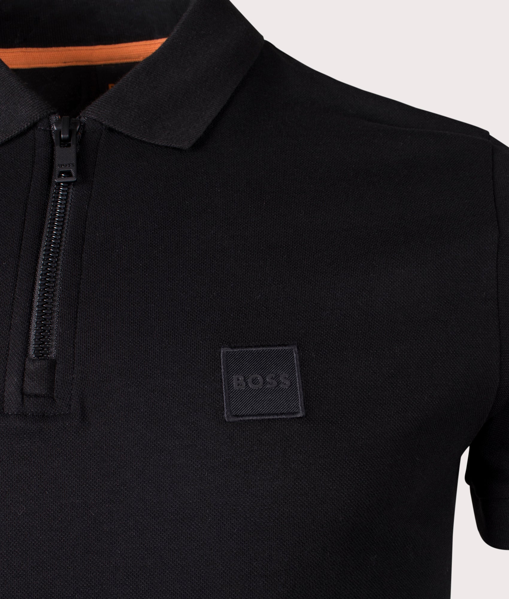 BOSS Slim Fit Passerzip Polo Shirt in Black at EQVVS. Detail Shot.