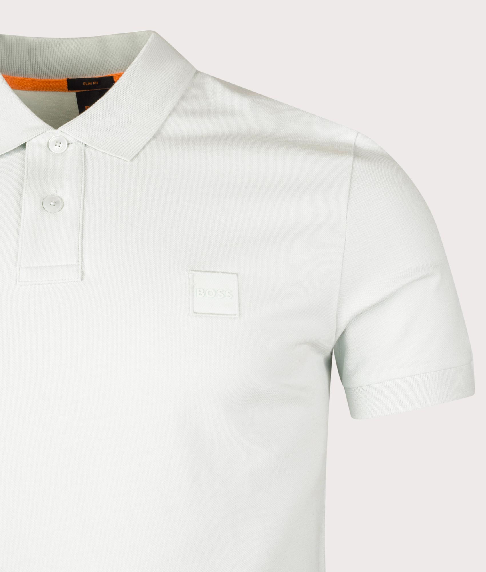 BOSS Slim Fit Passenger Polo Shirt in Open Blue . Shot at EQVVS. Front detail shot 