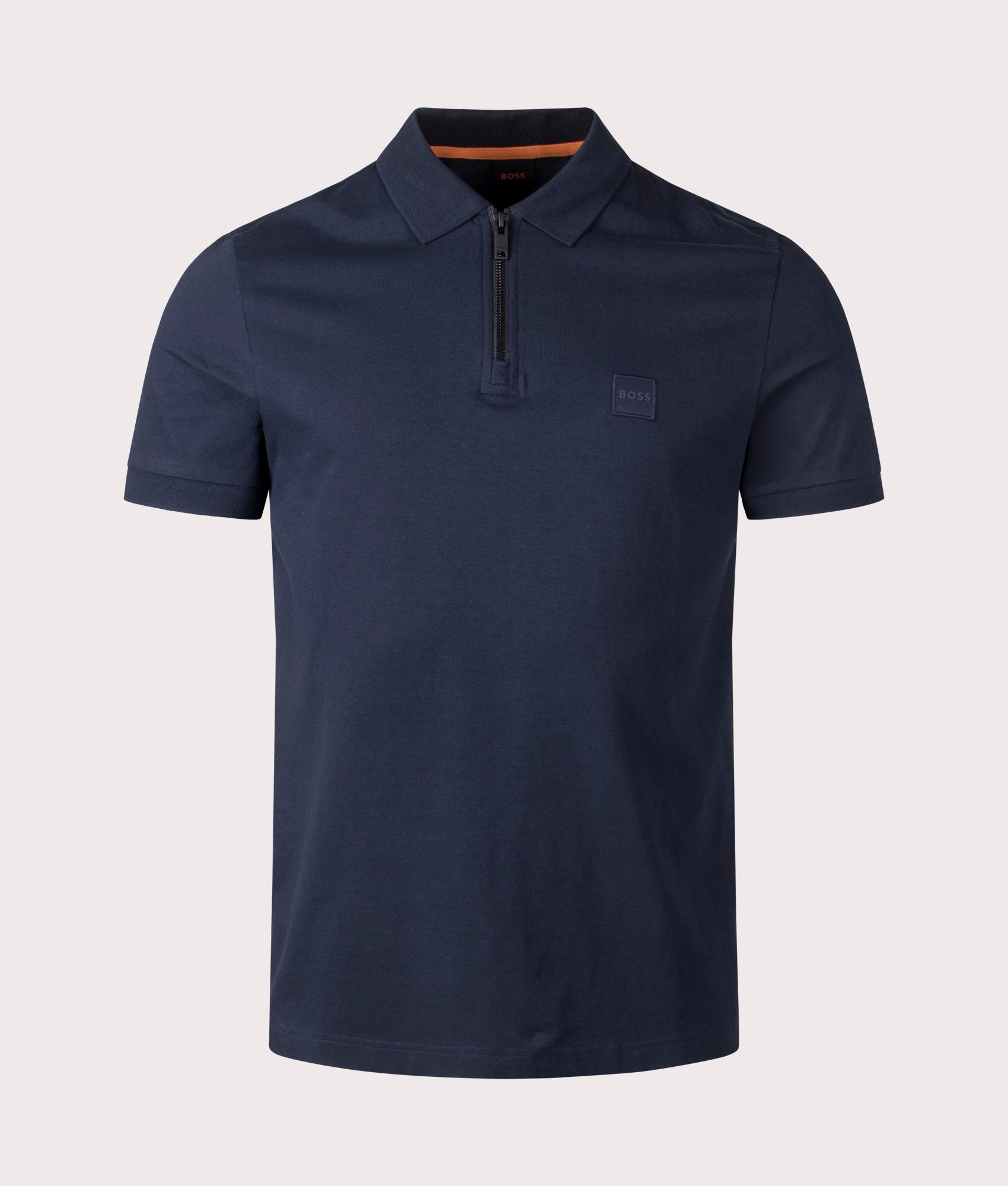 BOSS Slim Fit Passerzip Polo Shirt in Dark Blue at EQVVS Menswear. Front shot.
