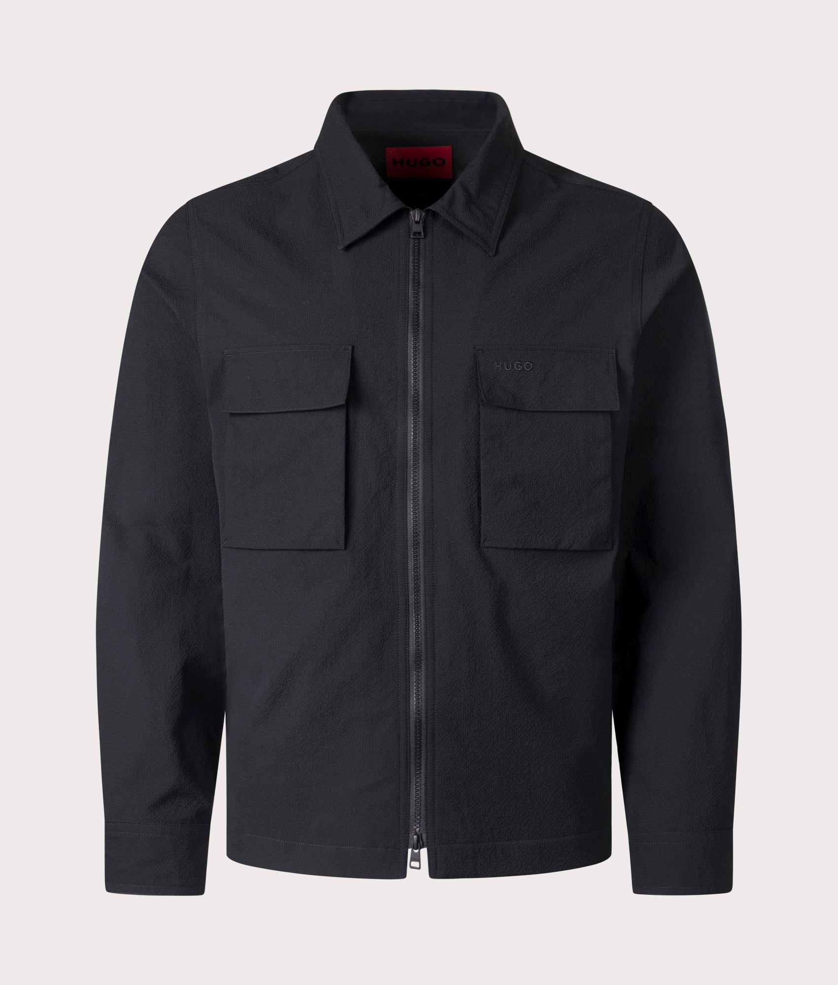 HUGO Oversized Eselio Zip Overshirt in Black at EQVVS. Front shot. 