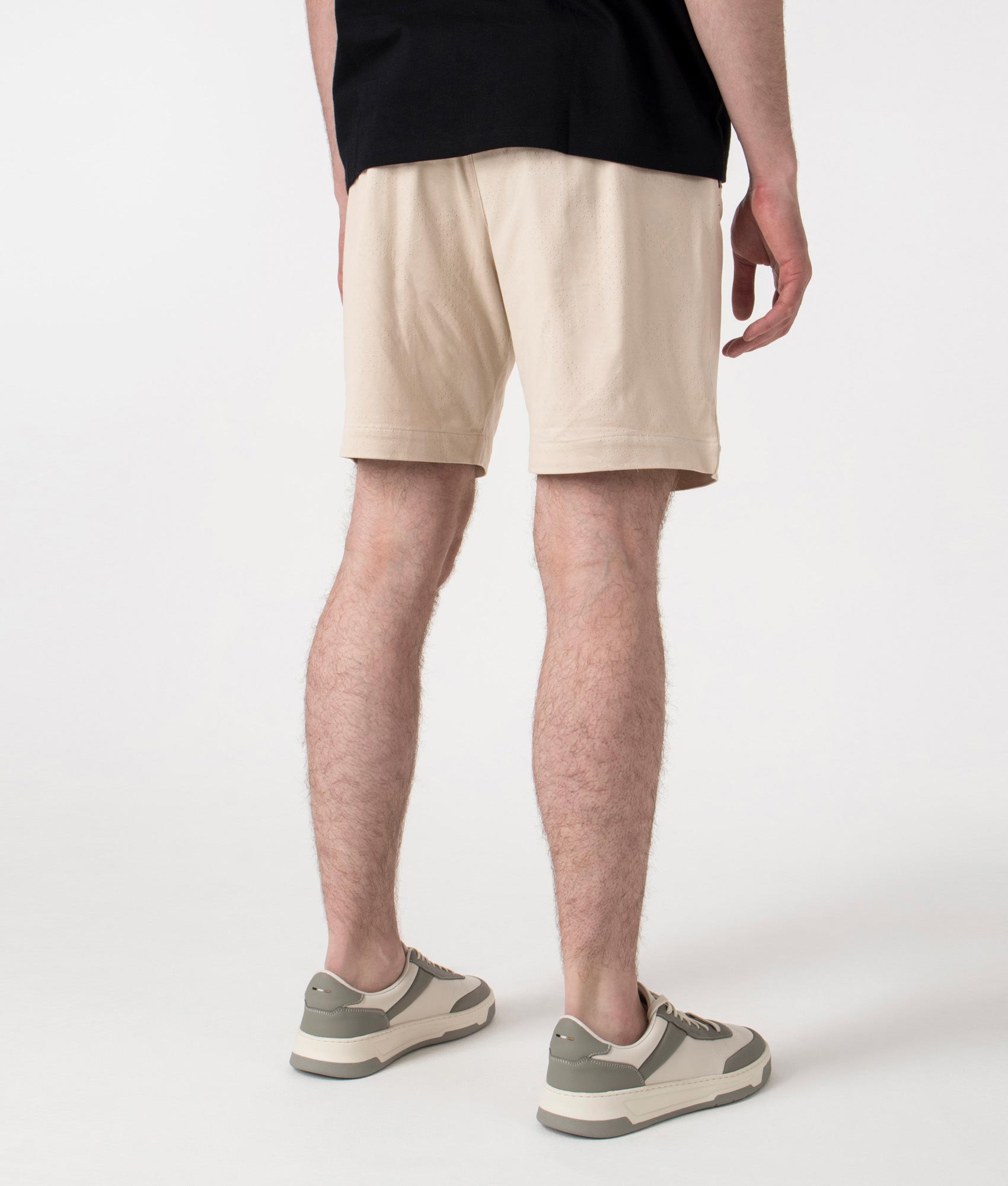 BOSS Relaxed Fit Mesh Heritage Shorts in Open Beige at EQVVS. Back Shot.