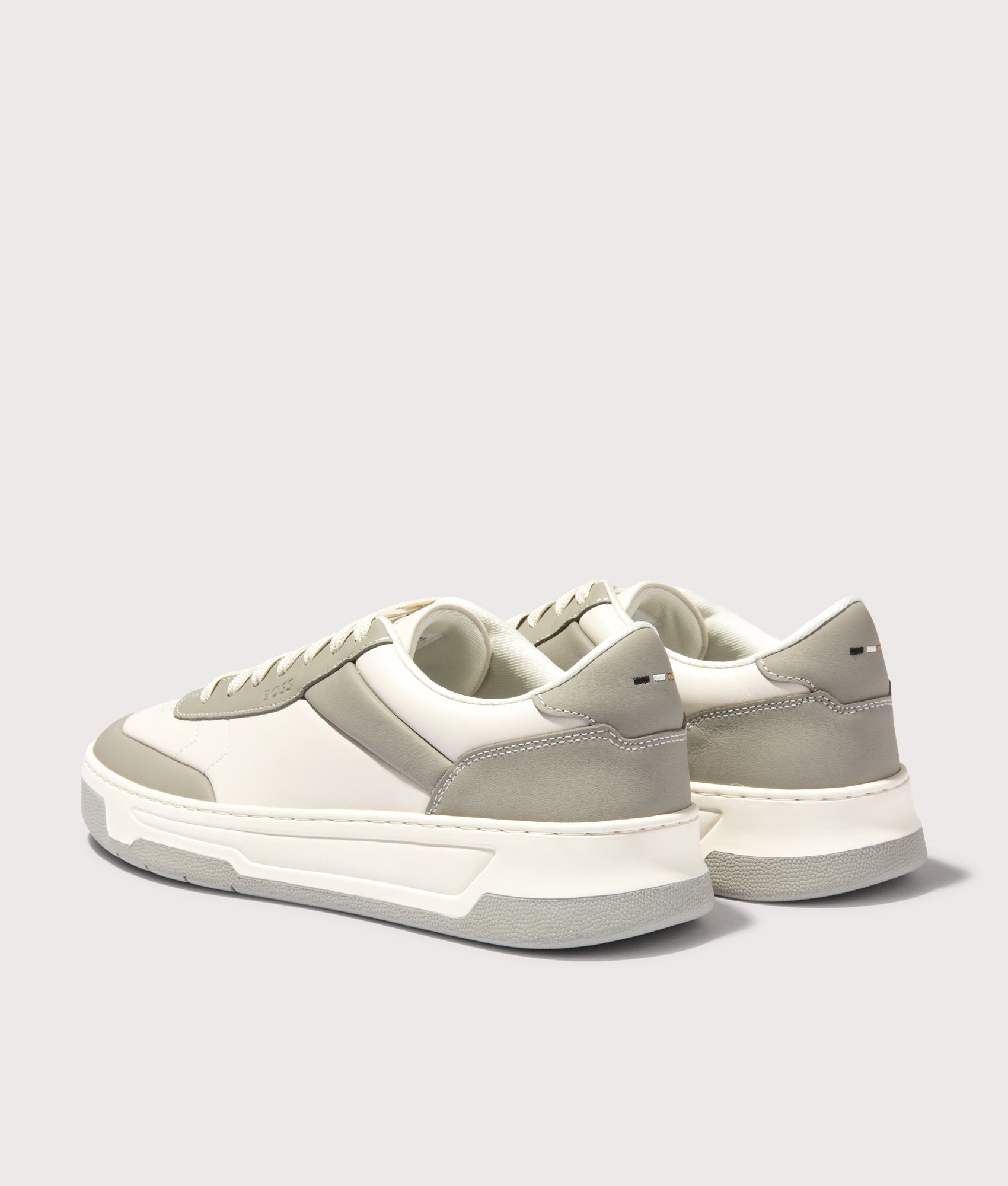 BOSS Baltimore Tenn Trainers in Open Grey at EQVVS Menswear. Angled back shot.