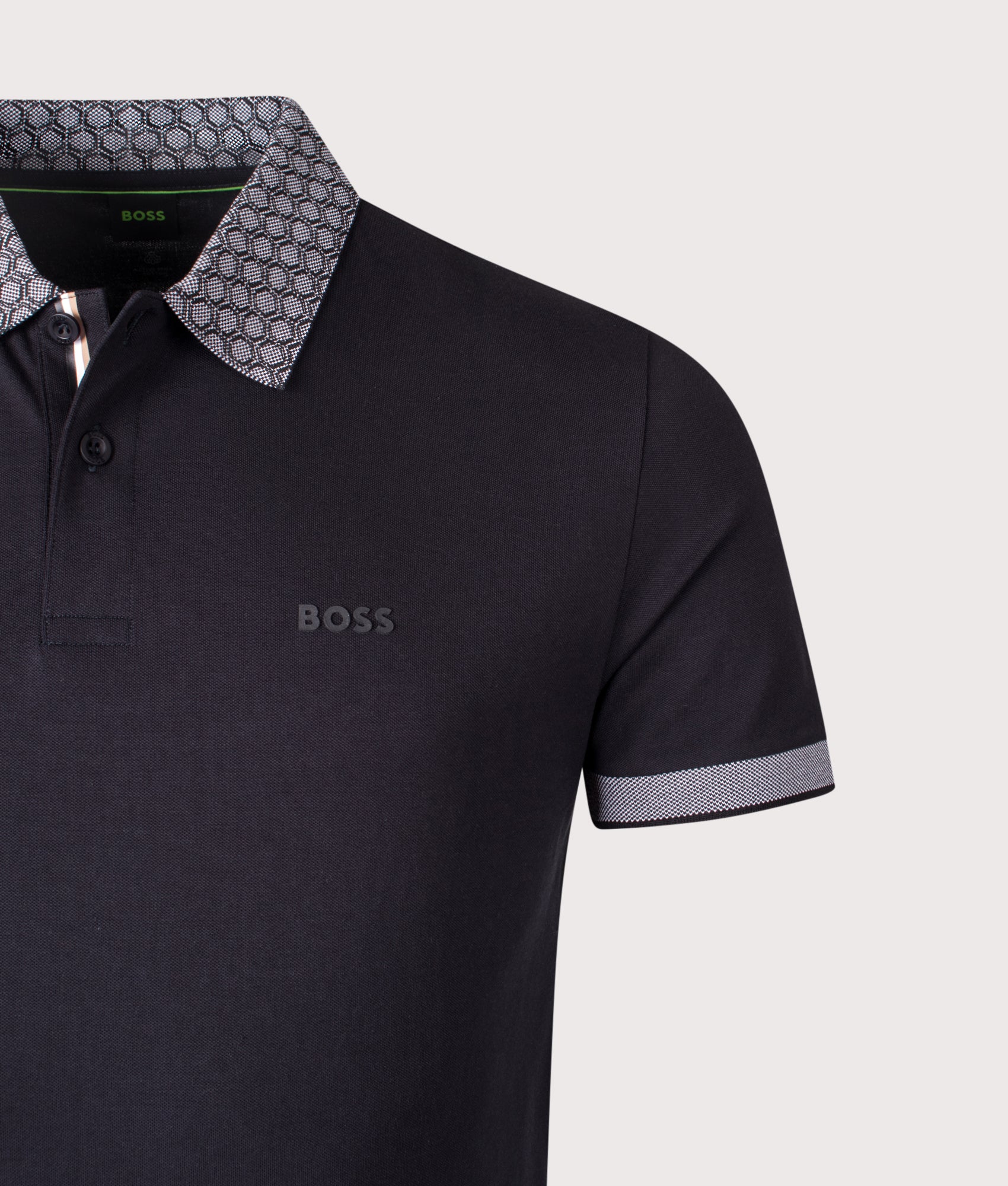 Chip Paddy Polo Shirt in Black | BOSS | EQVVS | Front detail shot 