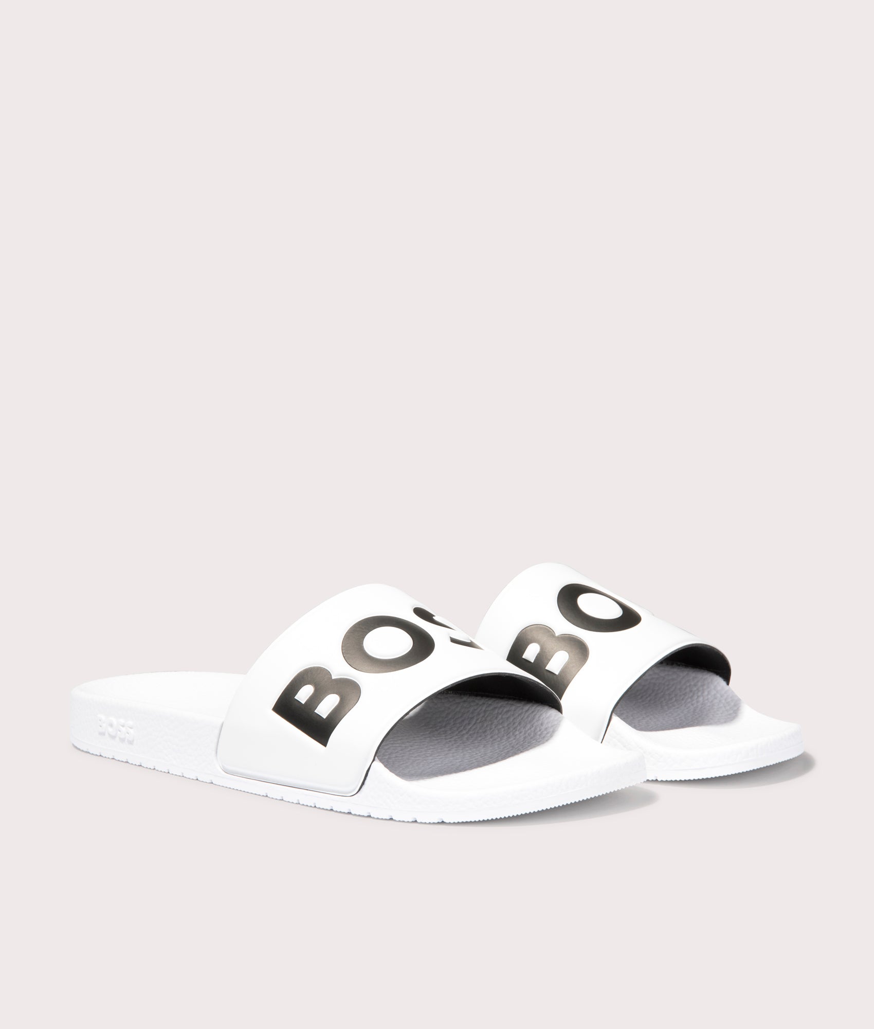 BOSS Aryeh Sliders in Natural. Front angle shot at EQVVS.