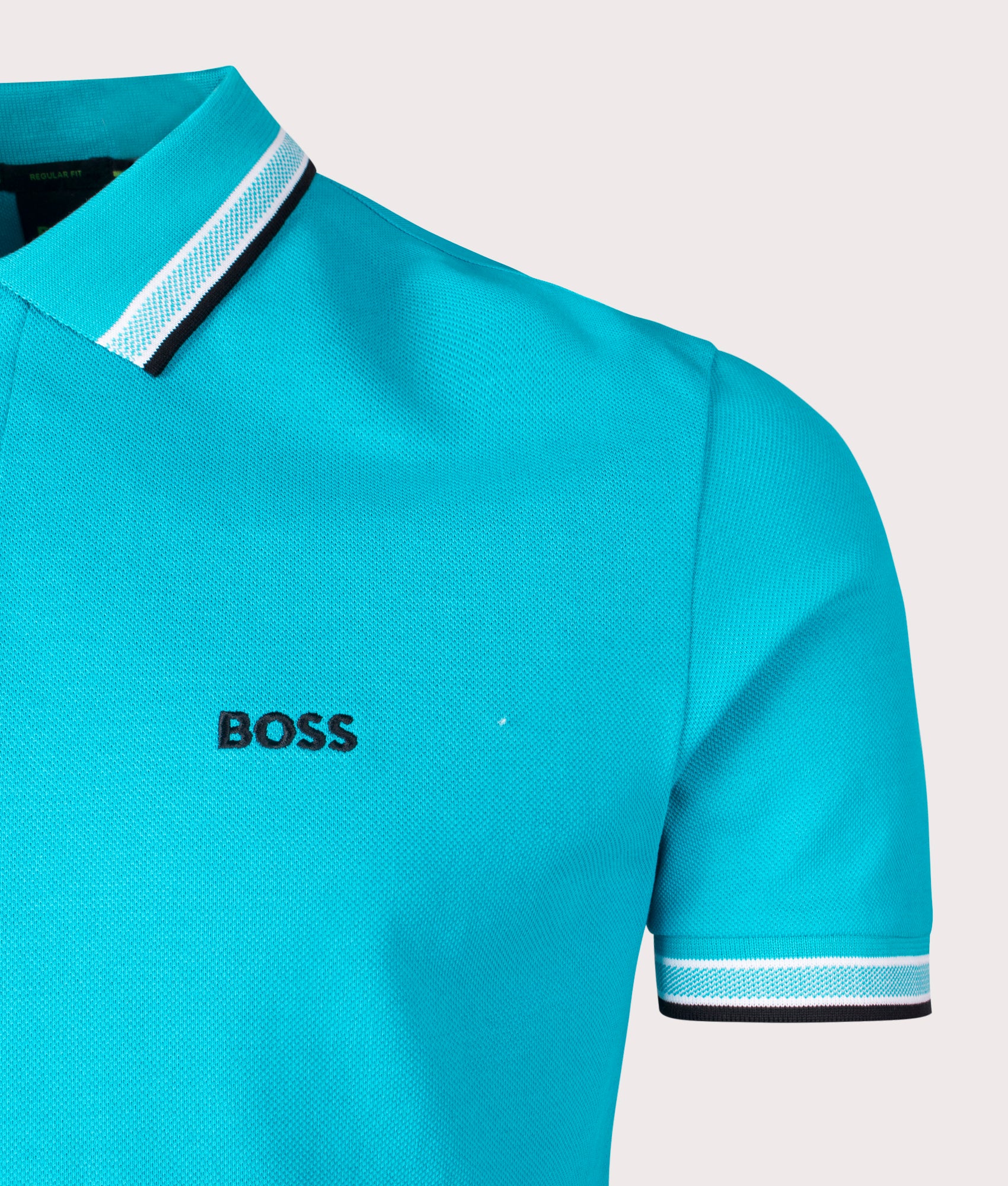 BOSS Paddy Polo Shirt in Light-Pastel Blue at EQVVS. Detail Shot.