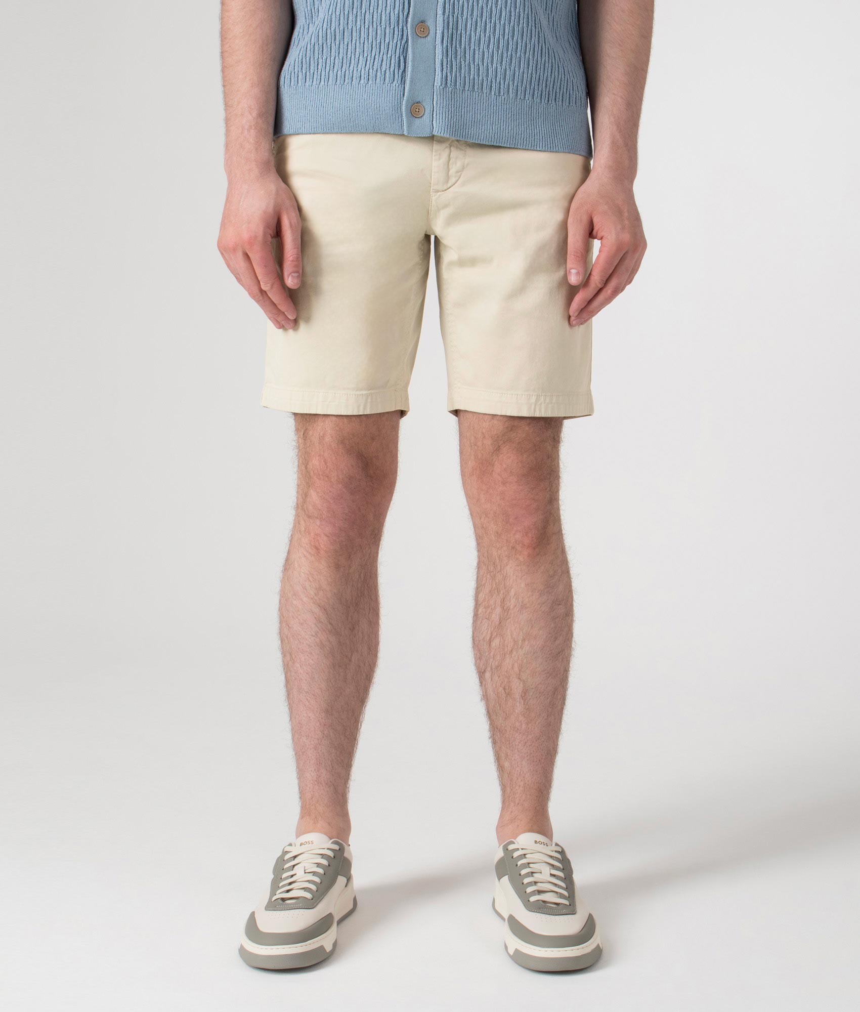 BOSS Slim Fit Chino Shorts in Light Beige at EQVVS. Front shot.
