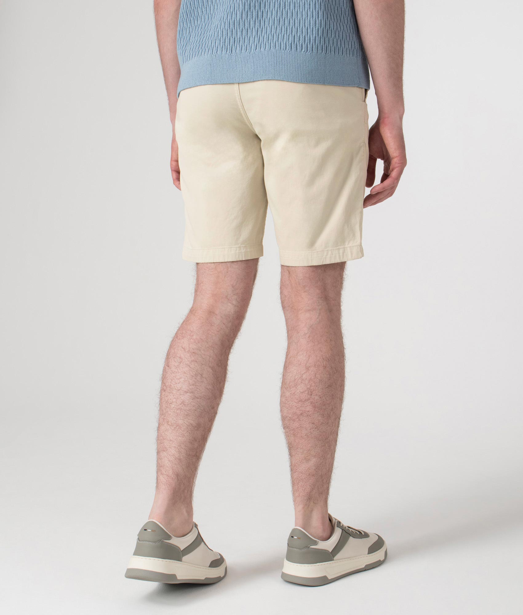 BOSS Slim Fit Chino Shorts in Light Beige at EQVVS. Back shot.