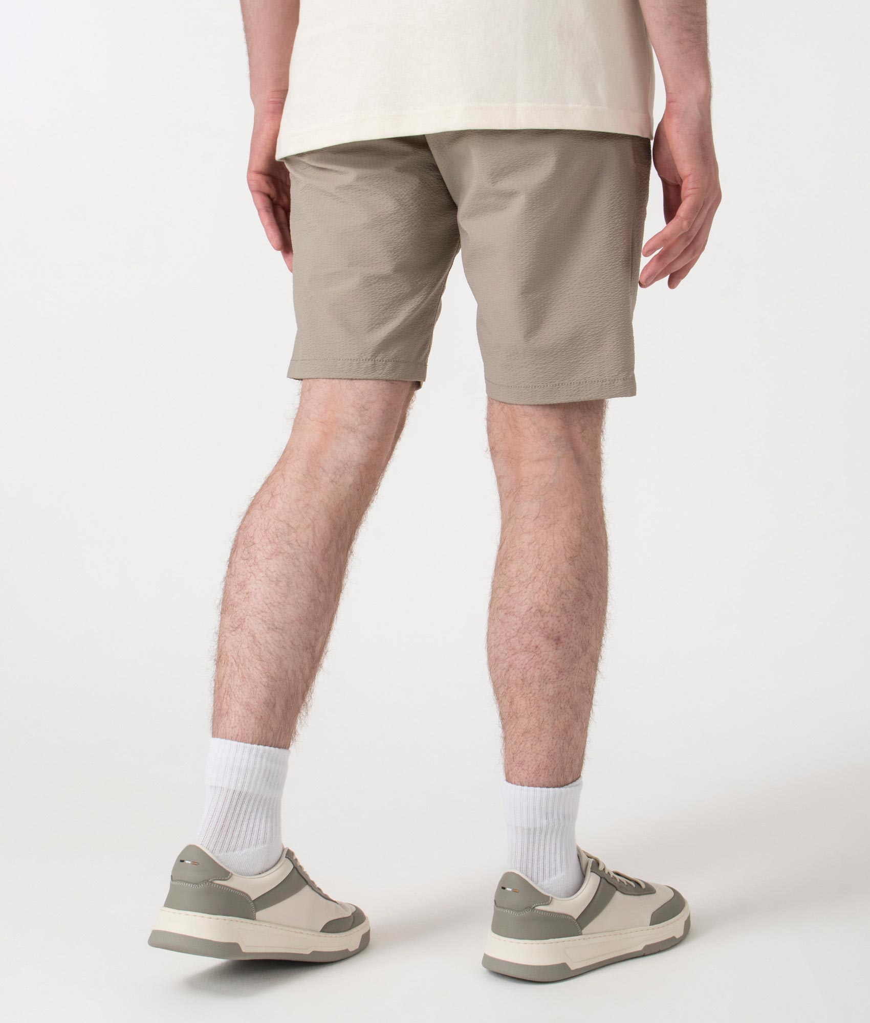 BOSS Regular Fit Tapered Chino Shorts in Open Beige at EQVVS. Back Shot.