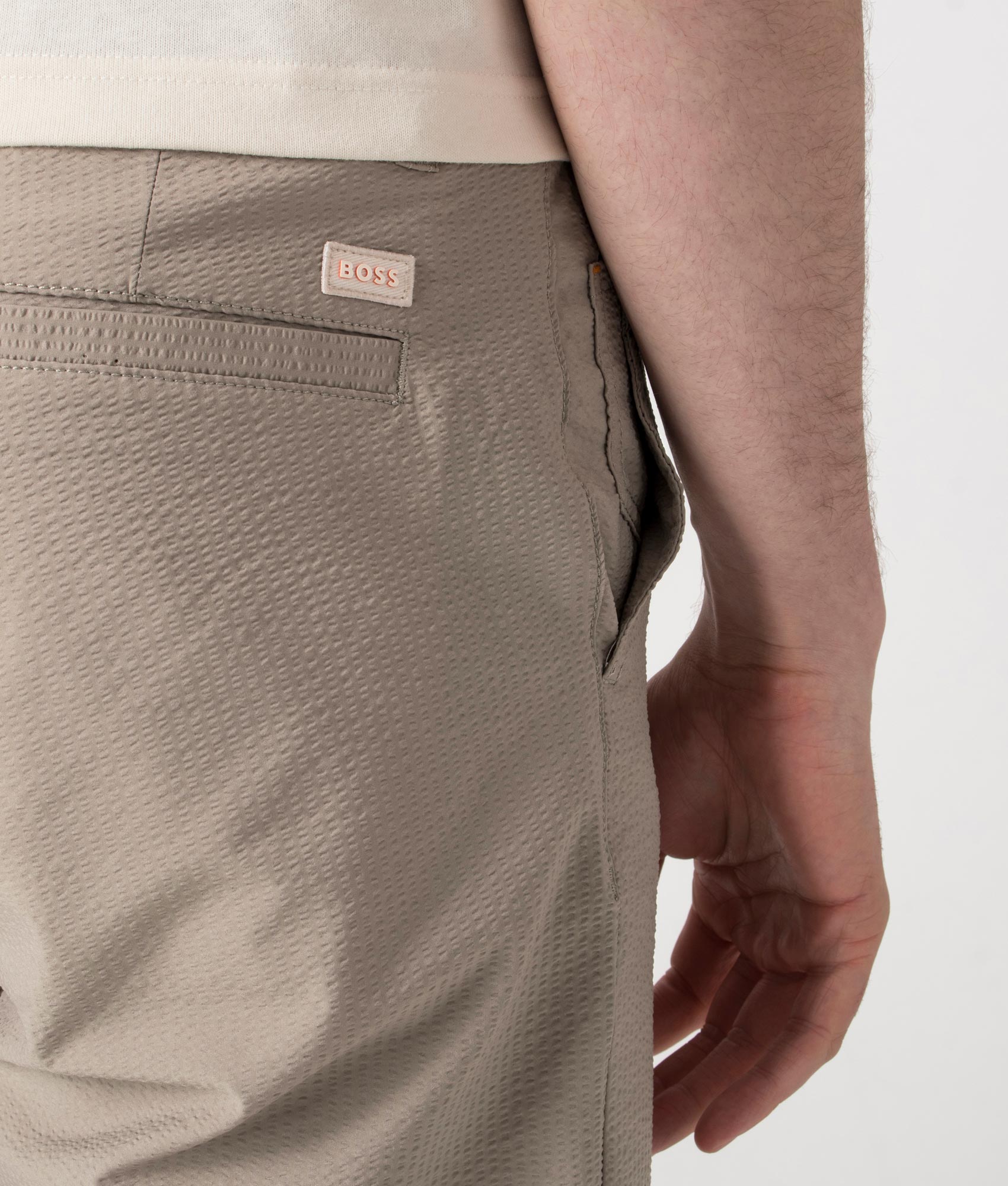 BOSS Regular Fit Tapered Chino Shorts in Open Beige at EQVVS. Back Shot.