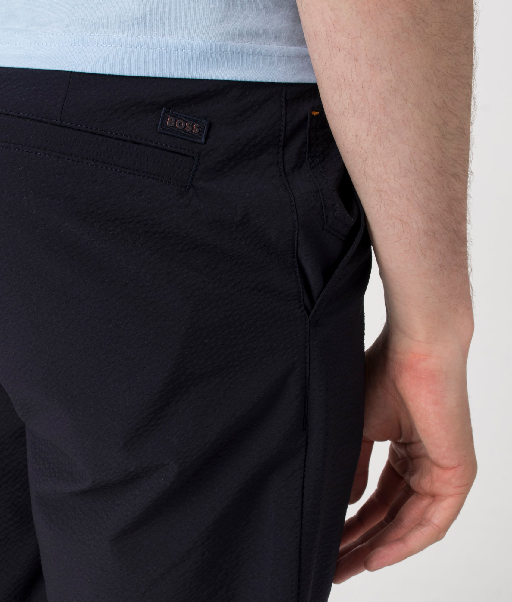 BOSS Regular Fit Tapered Chino Shorts in Dark Blue at EQVVS. Detail Shot.