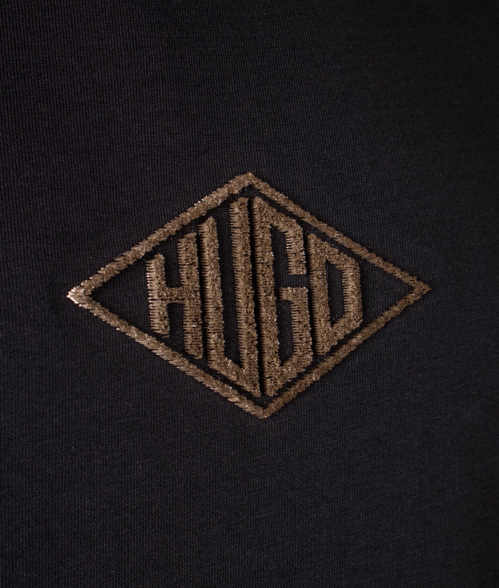 Hugo Relaxed Fit Dalendi T-Shirt in Black. Shot at EQVVS.  Front logo shot 
