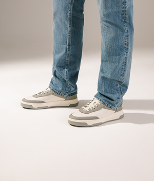 BOSS Baltimore Tenn Trainers in Open Grey at EQVVS Menswear. Campaign shot.