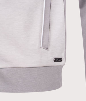 Tracksuit Jacket in Light/Pastel Grey. Cotton blend | BOSS | Shot at EQVVS | Front hem detail shot 