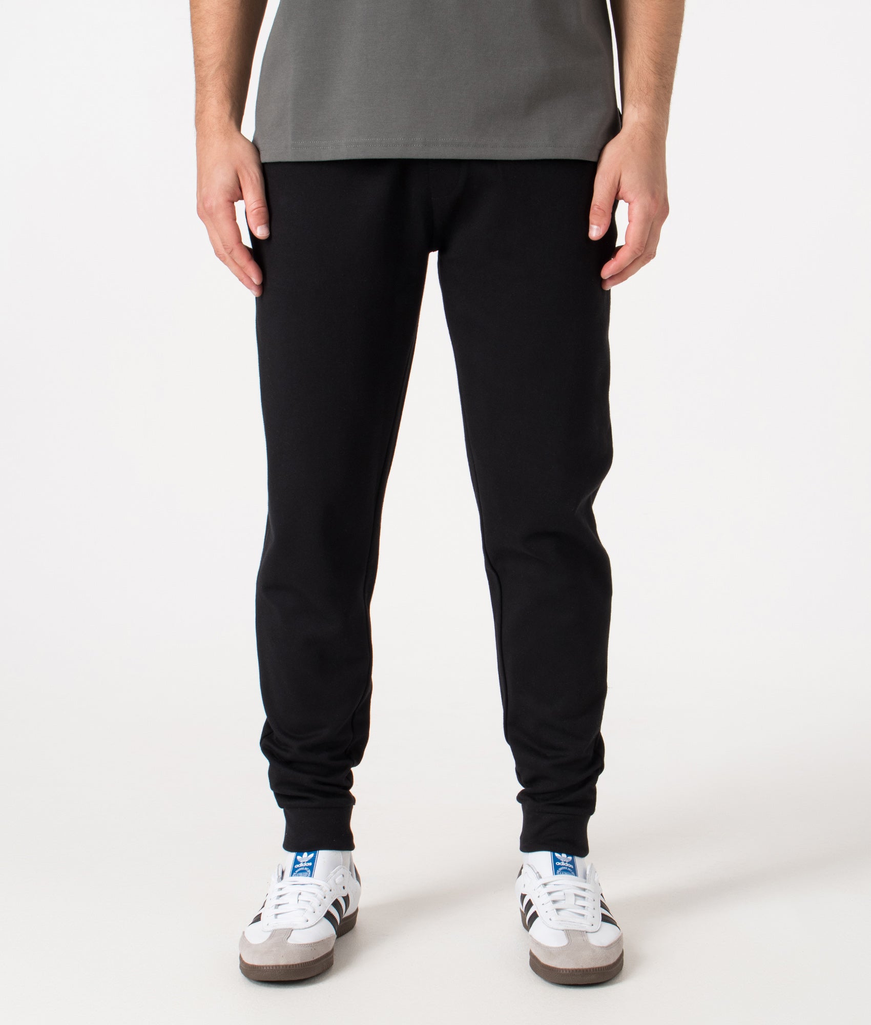 Tracksuit Pants by BOSS in Black. Shot by EQVVS. Front shot.