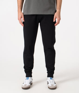 Tracksuit Pants by BOSS in Black. Shot by EQVVS. Front shot.