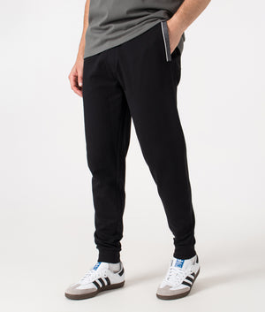 Tracksuit Pants by BOSS in Black. Shot by EQVVS. Front detail shot.