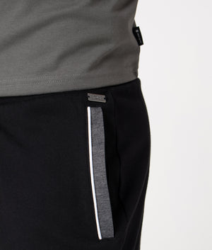 Tracksuit Pants by BOSS in Black. Shot by EQVVS. Detail shot.