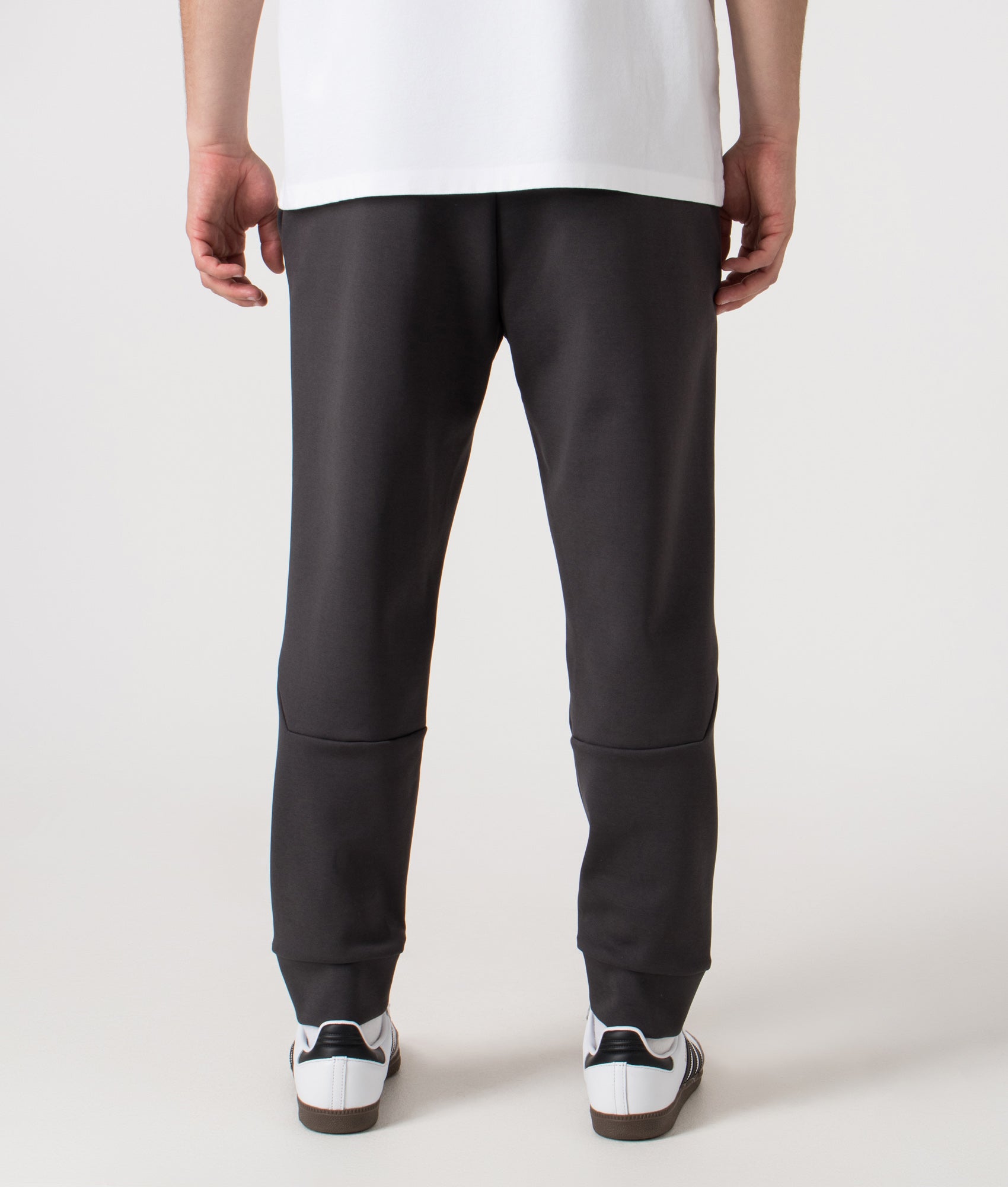 Zone Track Pants in Light/Pastel Grey. Cotton blend | BOSS | Shot at EQVVS |  Back shot