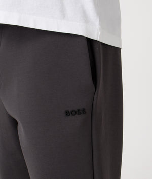 Zone Track Pants in Light/Pastel Grey. Cotton blend | BOSS | Shot at EQVVS | Detail shot 