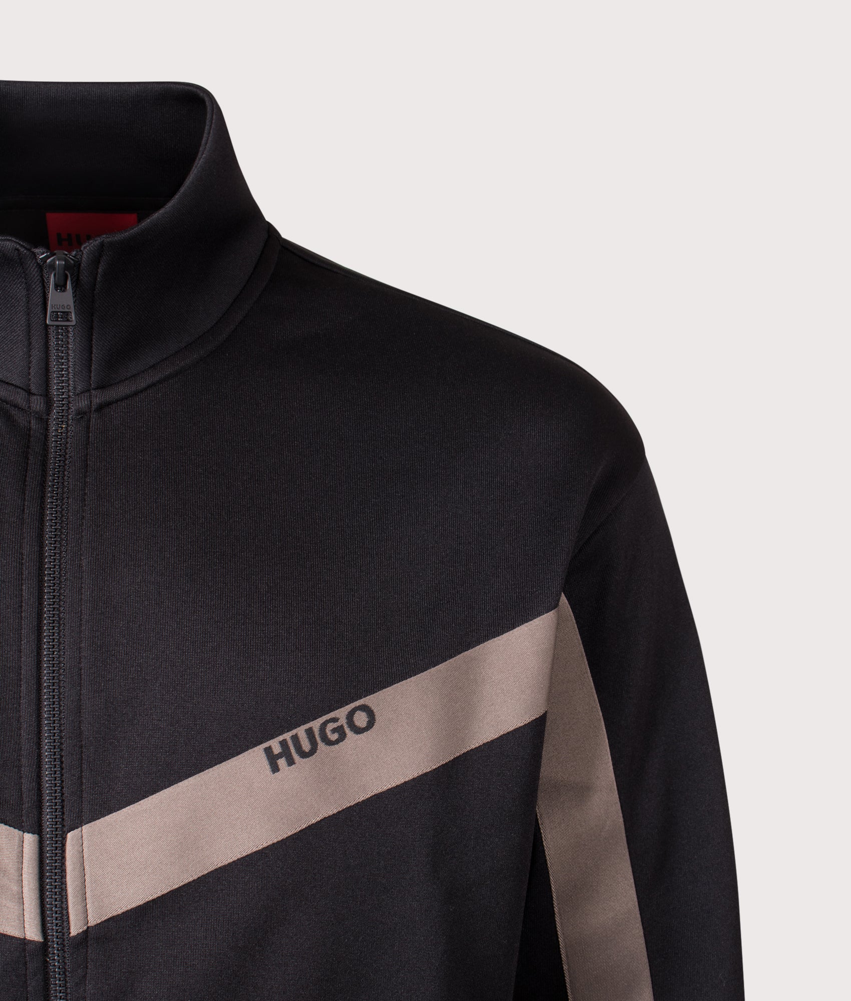 Relaxed Fit Darti Zip Through Track Top in Black | HUGO | EQVVS | Front detail shot 