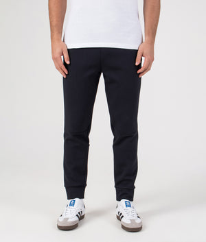Regular Fit Zone Track Pants in Dark Blue | BOSS | EQVVS | Front model shot