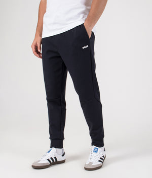 Regular Fit Zone Track Pants in Dark Blue | BOSS | EQVVS | Front angle model shot